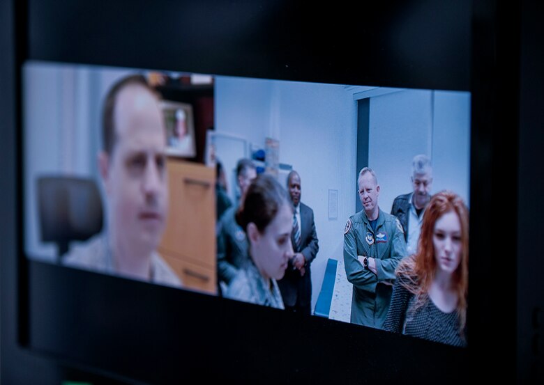 Members of the 52nd Fighter Wing leadership use the Telehealth cart to video conference with Landstuhl Regional Medical Center after the 52nd Medical Group/LRMC Telehealth ribbon cutting inside the 52nd MDG clinic April 1, 2016, at Spangdahlem Air Base, Germany. The Telehealth cart uses VTC and other medical instruments to provide doctors from LRMC with real-time readings on patient vital signs. (U.S. Air Force photo by Senior Airman Rusty Frank/Released)
