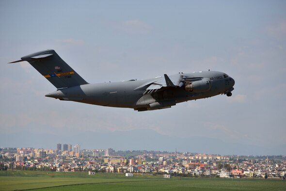 The first C-17 Globemaster III with families of U.S. Airmen and Department of Defense civilians takes off from Incirlik Air Base, Turkey, March 30, 2016. On March 29, 2016, the Secretary of Defense, in coordination with the Secretary of State, ordered the departure of all Department of Defense dependents assigned to Incirlik Air Base. (U.S. Air Force photo by Senior Airman John Nieves Camacho/Released)