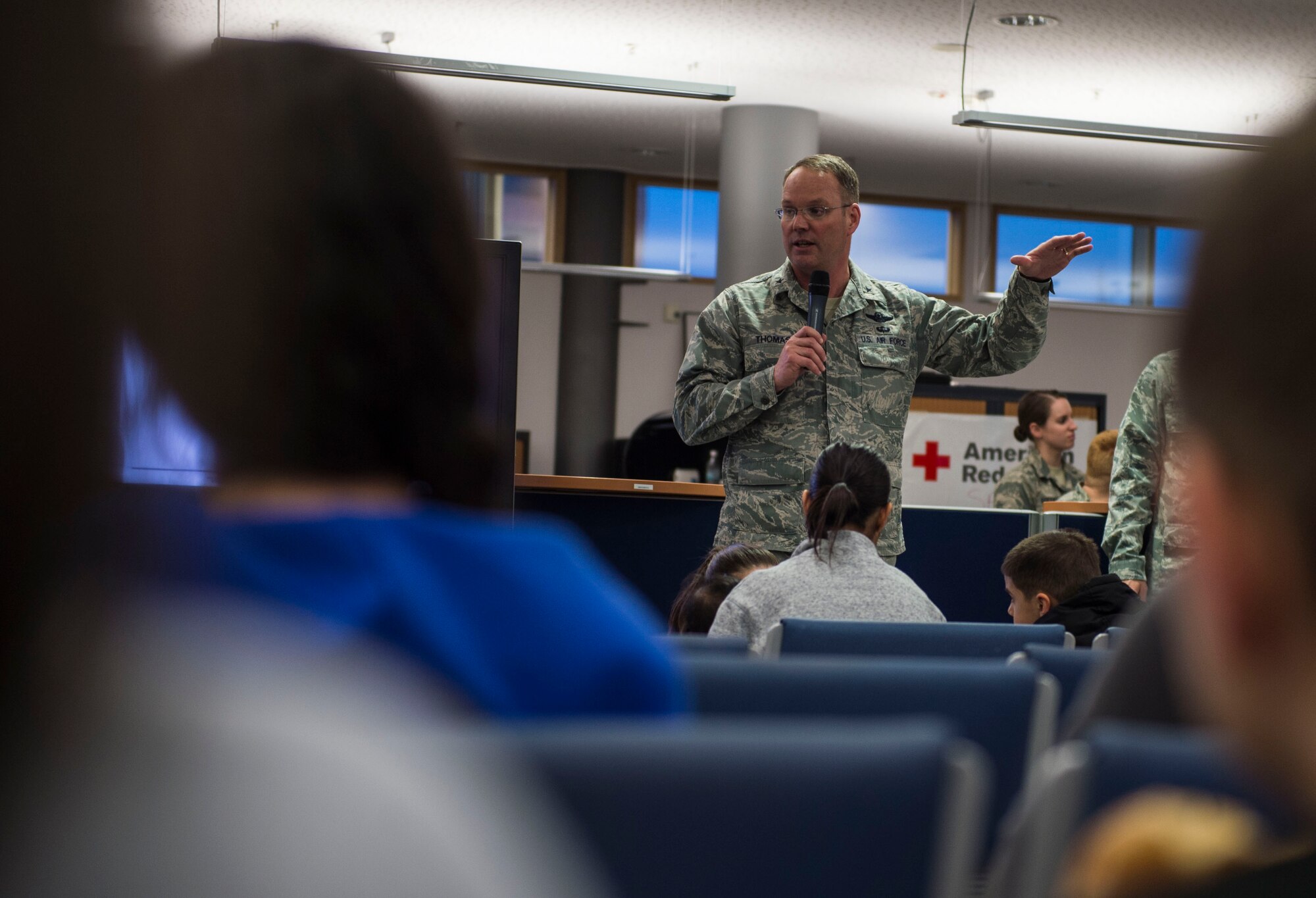 Brig. Gen. Jon T. Thomas, 86th Airlift Wing commander, welcomes a group of Air Force families to Ramstein Air Base, Germany, March 30, 2016. The families were amongst the first to arrive at Ramstein after the State Department and the Secretary of Defense approved the ordered departure of dependents of service members and Defense Department civilian personnel currently stationed in Adana, Izmir, and Mugla, Turkey. (U.S. Air Force photo/Staff Sgt. Sara Keller)