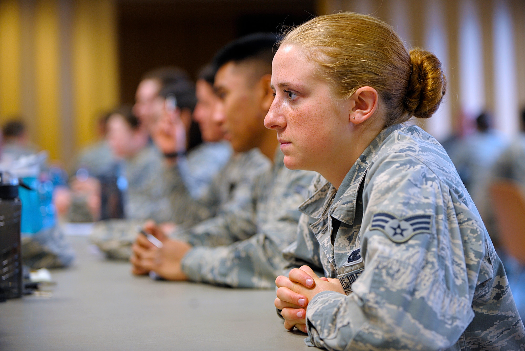 Senior Airman Nadine Peterson, 86th Security Forces Squadron armorer, and other Airmen listen to mentors during a speed mentoring session March 28, 2016, at Ramstein Air Base, Germany. Airmen ranging in rank of airman to technical sergeant were mentored by nearly 20 senior NCOs, officers and retirees during the speed mentoring session hosted by the Total Force Development Council and the Ramstein Air Force Association Chapter 507. (U.S. Air Force photo/Staff Sgt. Timothy Moore)