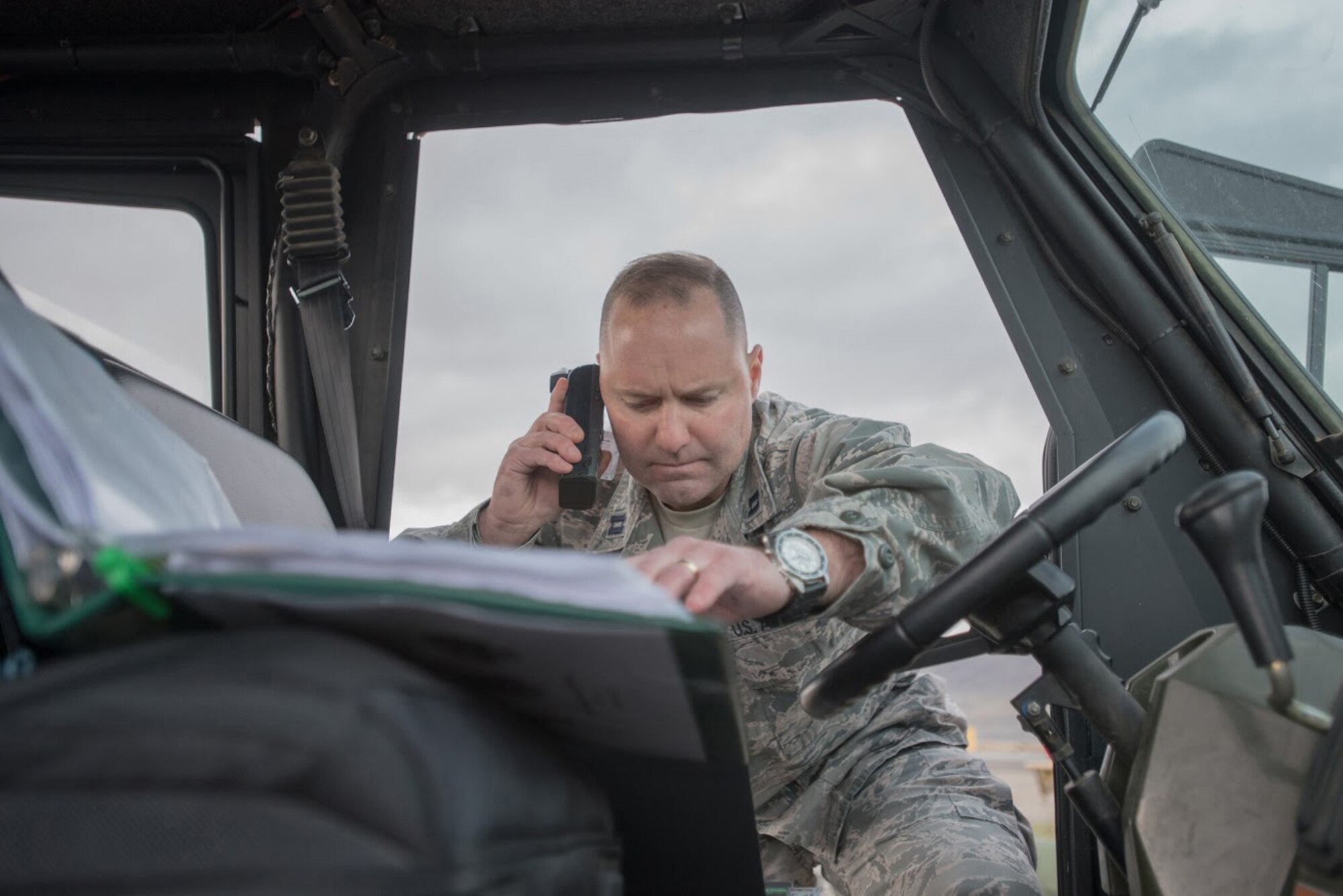U.S. Air Force Capt. James Embry, air operations officer with the Kentucky Air National Guard’s 123rd Contingency Response Group, communicates joint mission-essential tasks to higher headquarters at Amedee Army Airfield, Calif., on March 6, 2016. The 123rd CRG is working in conjunction with the U.S. Army’s 688th Rapid Port Opening Element and a team from the Defense Logistics Agency to operate Joint Task Force-Port Opening Sangala during a week-long exercise called Operation Lumberjack. The objective of the JTF-PO is to establish an aerial port of debarkation, provide initial distribution capability and set up warehousing for distribution beyond a forward node. (Kentucky Air National Guard photo by Master Sgt. Phil Speck)