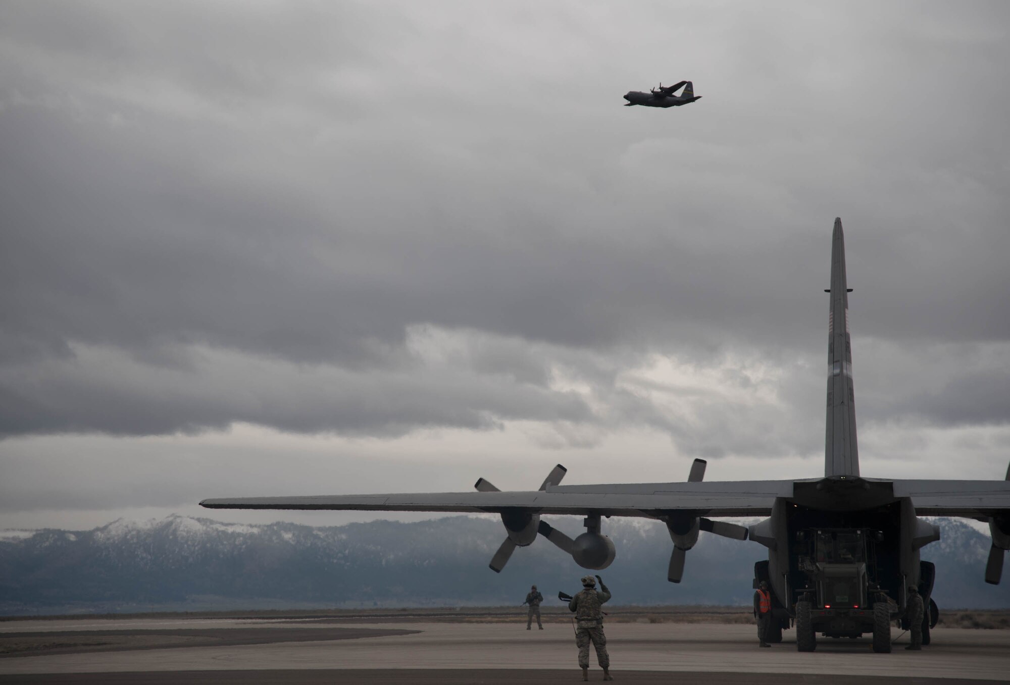 A C-130 Hercules aircraft from the Wyoming Air National Guard delivers cargo to Amedee Army Airfield, Calif., in support of Operation Lumberjack on March 8, 2016. The Kentucky Air National Guard’s 123rd Contingency Response Group is working in conjunction with the U.S. Army’s 688th Rapid Port Opening Element and a team from the Defense Logistics Agency to operate Joint Task Force-Port Opening Sangala during the week-long exercise. The objective of the JTF-PO is to establish an aerial port of debarkation, provide initial distribution capability and set up warehousing for distribution beyond a forward node. (Kentucky Air National Guard photo by 1st Lt. James Killen)