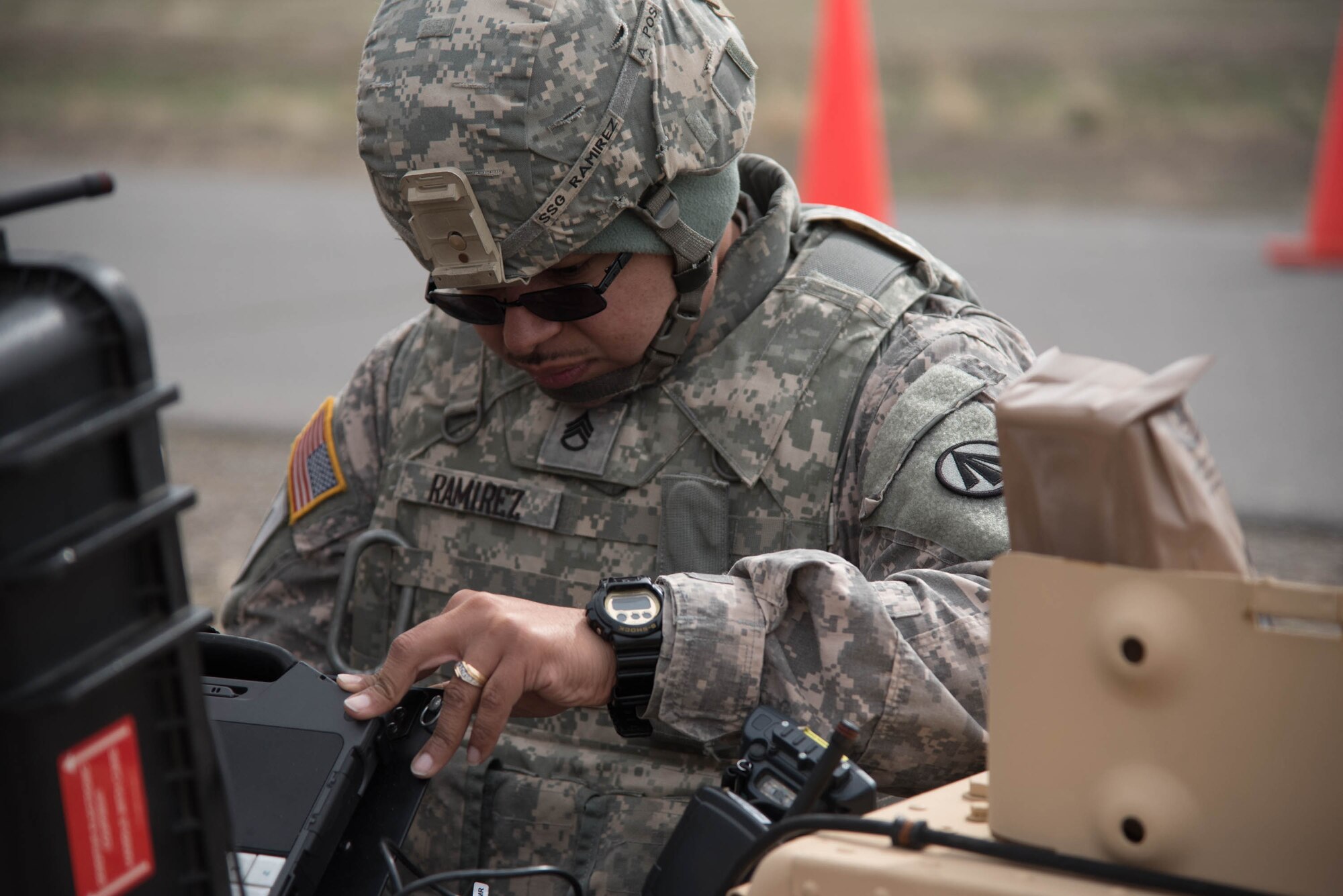 U.S. Army Staff Sgt. Eric Ramirez, in-transit visibility NCOIC for the 688th Rapid Port Opening Element, inspects his equipment at Amedee Army Airfield, Calif., March 8, 2016. The U.S. Army’s 688th RPOE is working in conjunction with the Kentucky Air National Guard’s 123rd Contingency Response Group and a team from the Defense Logistics Agency to operate Joint Task Force-Port Opening Sangala during a week-long exercise called Operation Lumberjack. The objective of the JTF-PO is to establish an aerial port of debarkation, provide initial distribution capability and set up warehousing for distribution beyond a forward node. (Kentucky Air National Guard photo by 1st Lt. James Killen)