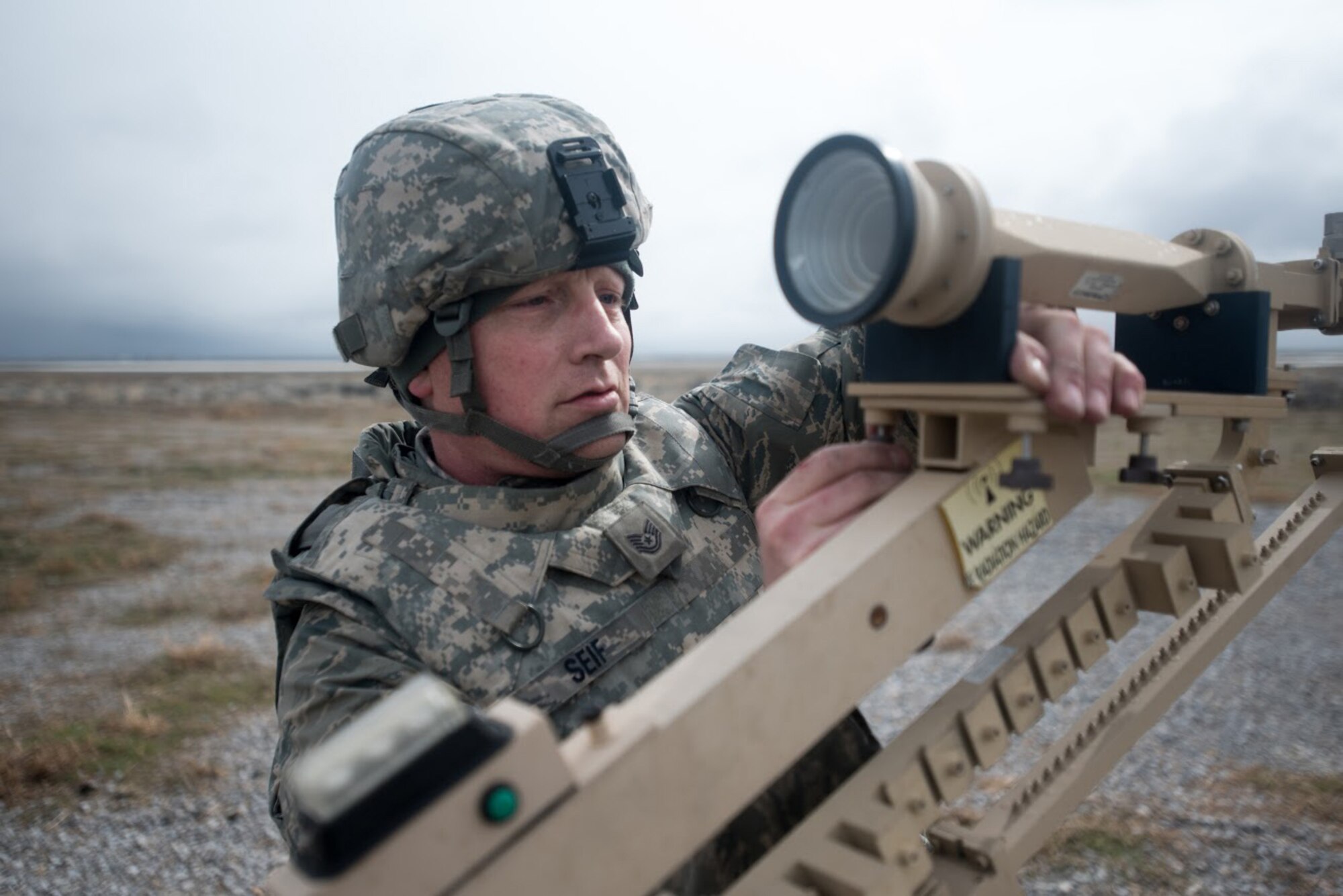 U.S. Air Force Tech. Sgt. Phil Seif, a communications specialist with the Kentucky Air National Guard’s 123rd Contingency Response Group, sets up a communication satellite at Amedee Army Airfield, Calif., on March 7, 2016. The 123rd CRG is working in conjunction with the U.S. Army’s 688th Rapid Port Opening Element and a team from the Defense Logistics Agency to operate Joint Task Force-Port Opening Sangala during a week-long exercise called Operation Lumberjack. The objective of the JTF-PO is to establish an aerial port of debarkation, provide initial distribution capability and set up warehousing for distribution beyond a forward node. (Kentucky Air National Guard photo by Master Sgt. Phil Speck)