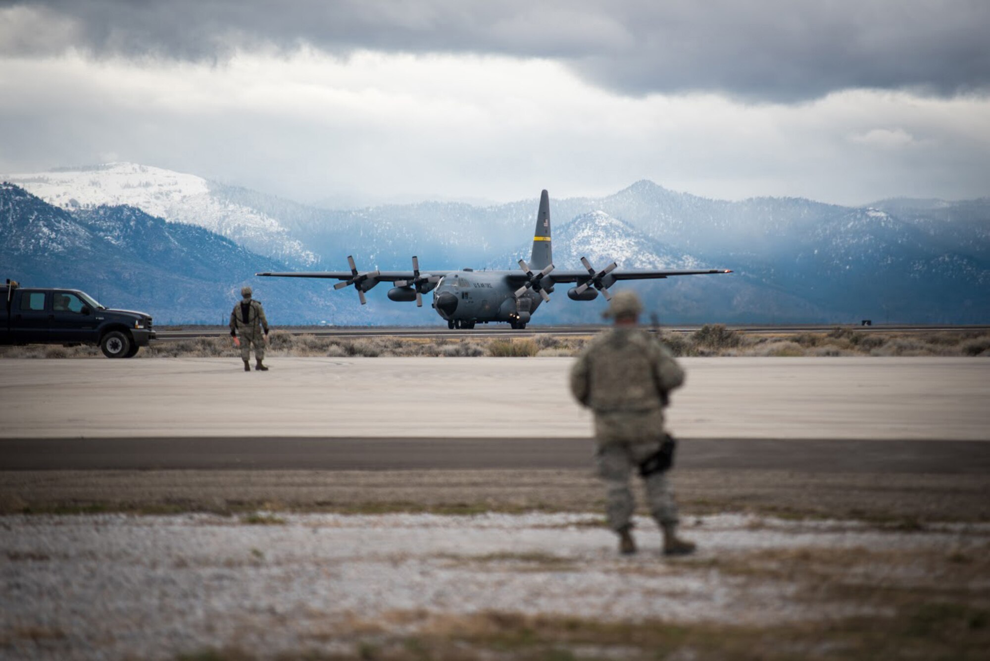 Members of the Kentucky Air National Guard’s 123rd Contingency Response Group prepare to unload a Wyoming Air National Guard C-130 Hercules at Amedee Army Airfield, Calif., on March 8, 2016. The 123rd CRG is working in conjunction with the U.S. Army’s 688th Rapid Port Opening Element and a team from the Defense Logistics Agency to operate Joint Task Force-Port Opening Sangala during a week-long exercise called Operation Lumberjack. The objective of the JTF-PO is to establish an aerial port of debarkation, provide initial distribution capability and set up warehousing for distribution beyond a forward node. (Kentucky Air National Guard photo by Master Sgt. Phil Speck)