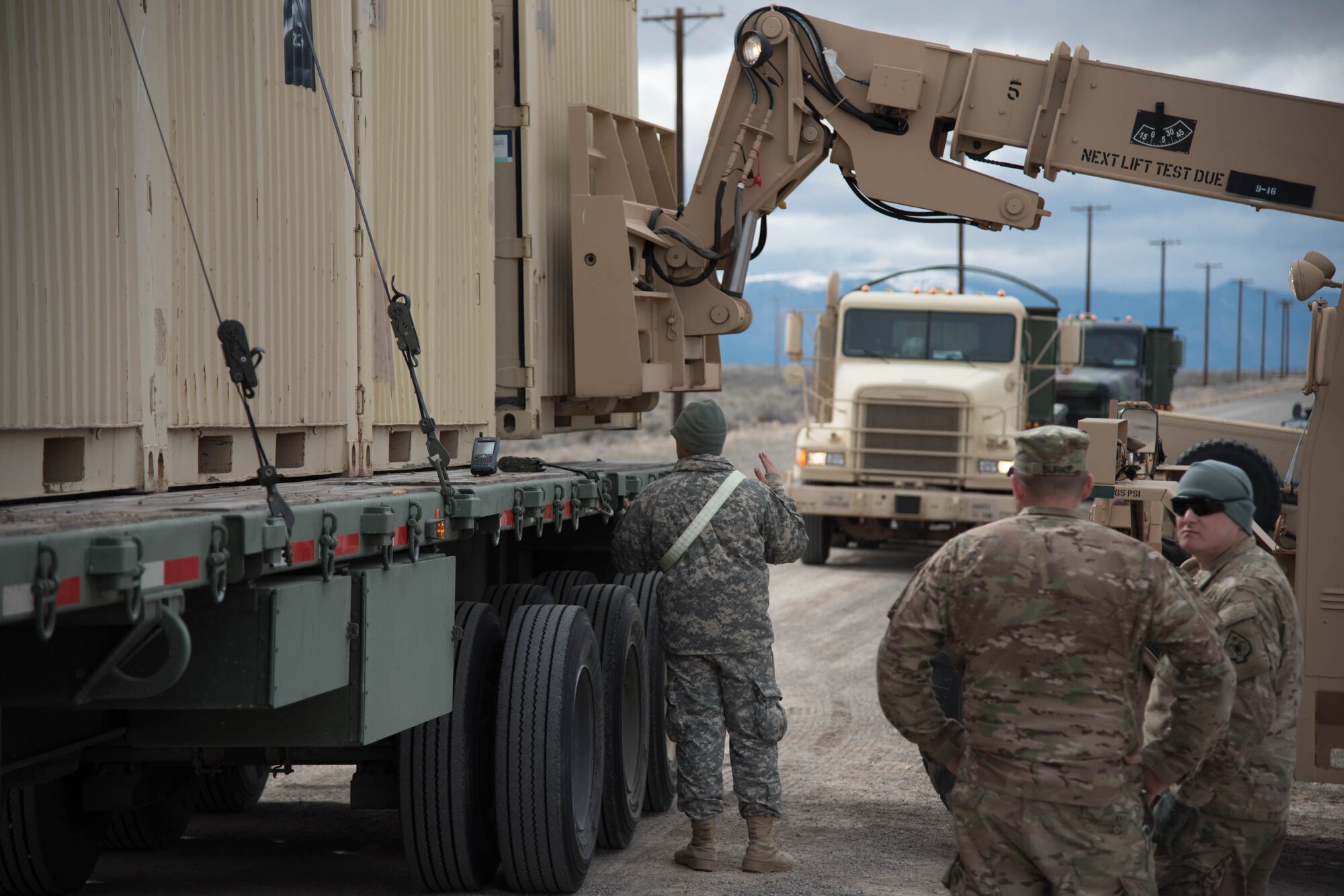 Soldiers from the U.S. Army’s 688th Rapid Port Opening Element secure equipment for transport from the forward node at Amedee Army Airfield, Calif., March 9, 2016. The 688th RPOE is working in conjunction with the Kentucky Air National Guard’s 123rd Contingency Response Group and a team from the Defense Logistics Agency to operate Joint Task Force-Port Opening Sangala during a week-long exercise called Operation Lumberjack. The objective of the JTF-PO is to establish an aerial port of debarkation, provide initial distribution capability and set up warehousing capability for distribution beyond a forward node. (Kentucky Air National Guard photo by 1st Lt. James Killen)