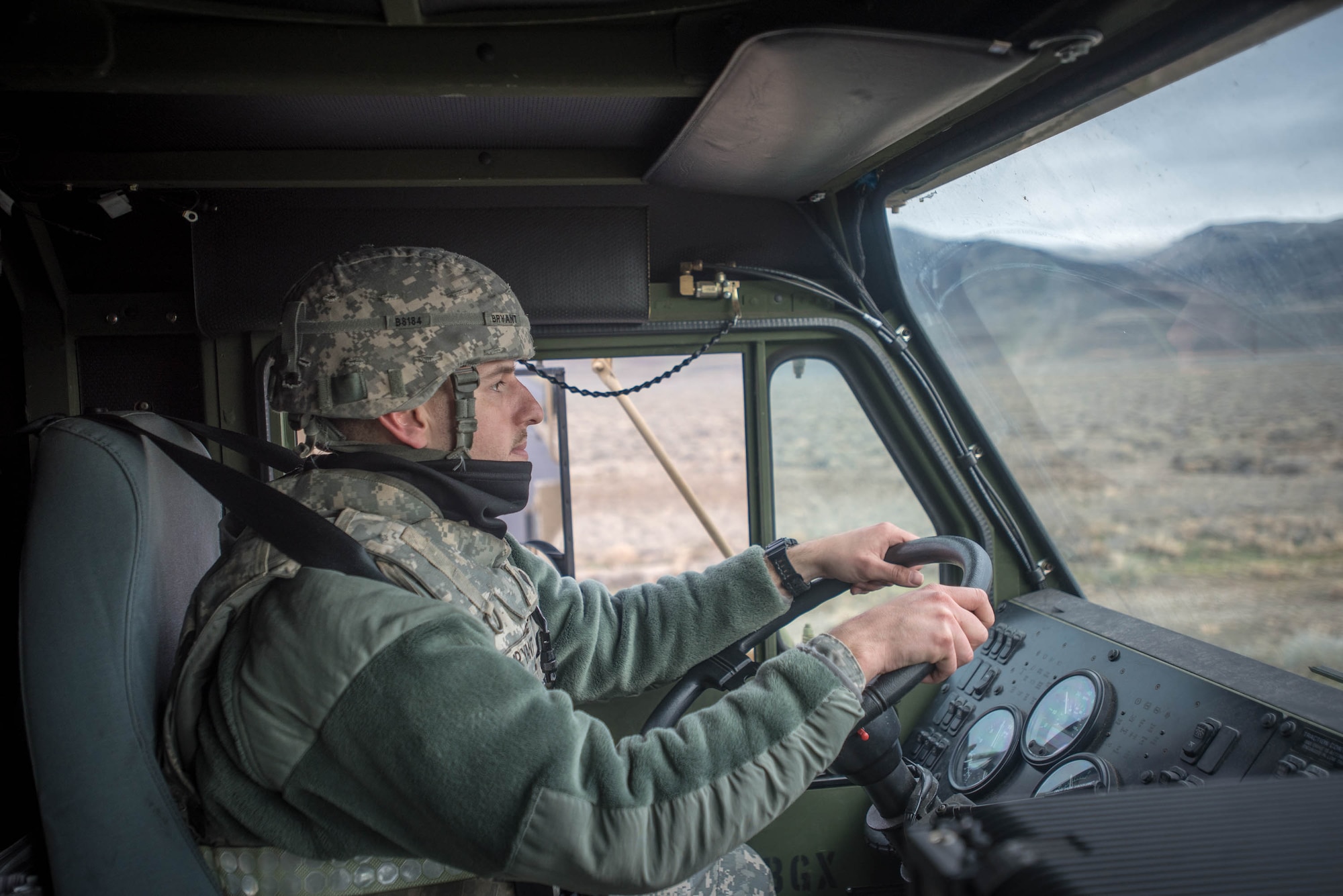 U.S. Army Spc. Anthony Bryant, a motor transport operator for the 688th Rapid Port Opening Element, drives a Load Handling System vehicle to transport cargo to the forward operating node at Amedee Army Airfield, Calif., on March 9, 2016. The 688th RPOE is working in conjunction with the Kentucky Air National Guard’s 123rd Contingency Response Group and a team from the Defense Logistics Agency to operate Joint Task Force-Port Opening Sangala during a week-long exercise called Operation Lumberjack. The objective of the JTF-PO is to establish an aerial port of debarkation, provide initial distribution capability and set up warehousing for distribution beyond the forward node. (Kentucky Air National Guard photo by Master Sgt. Phil Speck)