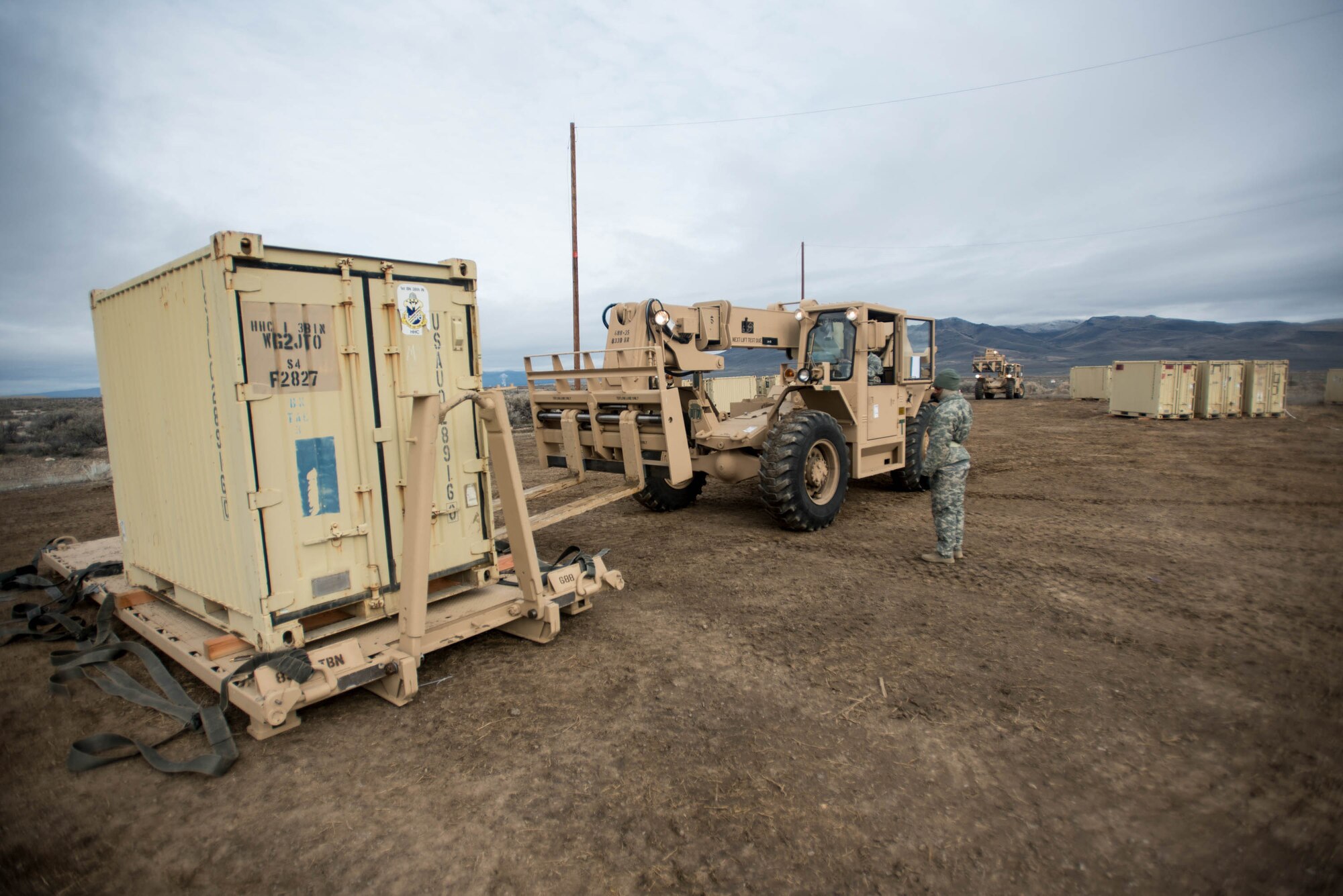 Soldiers from the U.S. Army’s 688th Rapid Port Opening Element move cargo at the forward operating node at Amedee Army Airfield, Calif., on March 9, 2016. The 688th RPOE is working in conjunction with the Kentucky Air National Guard’s 123rd Contingency Response Group and a team from the Defense Logistics Agency to operate Joint Task Force-Port Opening Sangala during a week-long exercise called Operation Lumberjack. The objective of the JTF-PO is to establish an aerial port of debarkation, provide initial distribution capability and set up warehousing for distribution beyond the forward node. (Kentucky Air National Guard photo by Master Sgt. Phil Speck)
