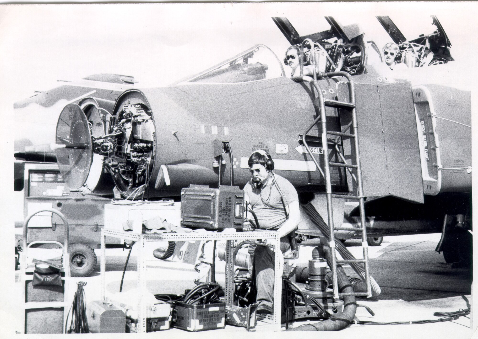 From left, Sgt. Tommy G. Ransom, Sgt. Jerry Gist and Airman 1st Class Mark Isenhower trouble shoot a broken F-4 Phantom jet radar system at Ebbing Air National Guard Base, Fort Smith, Ark. (Courtesy photo)
