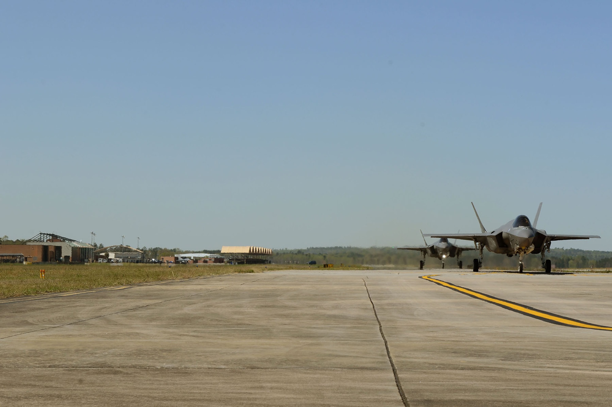 Two U.S. Air Force F-35A Lightning II fighter jets, assigned to the 33rd Fighter Wing from Eglin Air Force Base, Fla., visit McEntire Joint National Guard Base, S.C., for the first time to train with F-16 Fighting Falcon fighter pilots from the South Carolina Air National Guard's 169th Fighter Wing, March 21, 2016.  The aircraft conducted 4th and 5th generation integration fighter training, during local training missions, March 21st and 22nd. (U.S. Air National Guard photo by Senior Airman Ashleigh Pavelek)