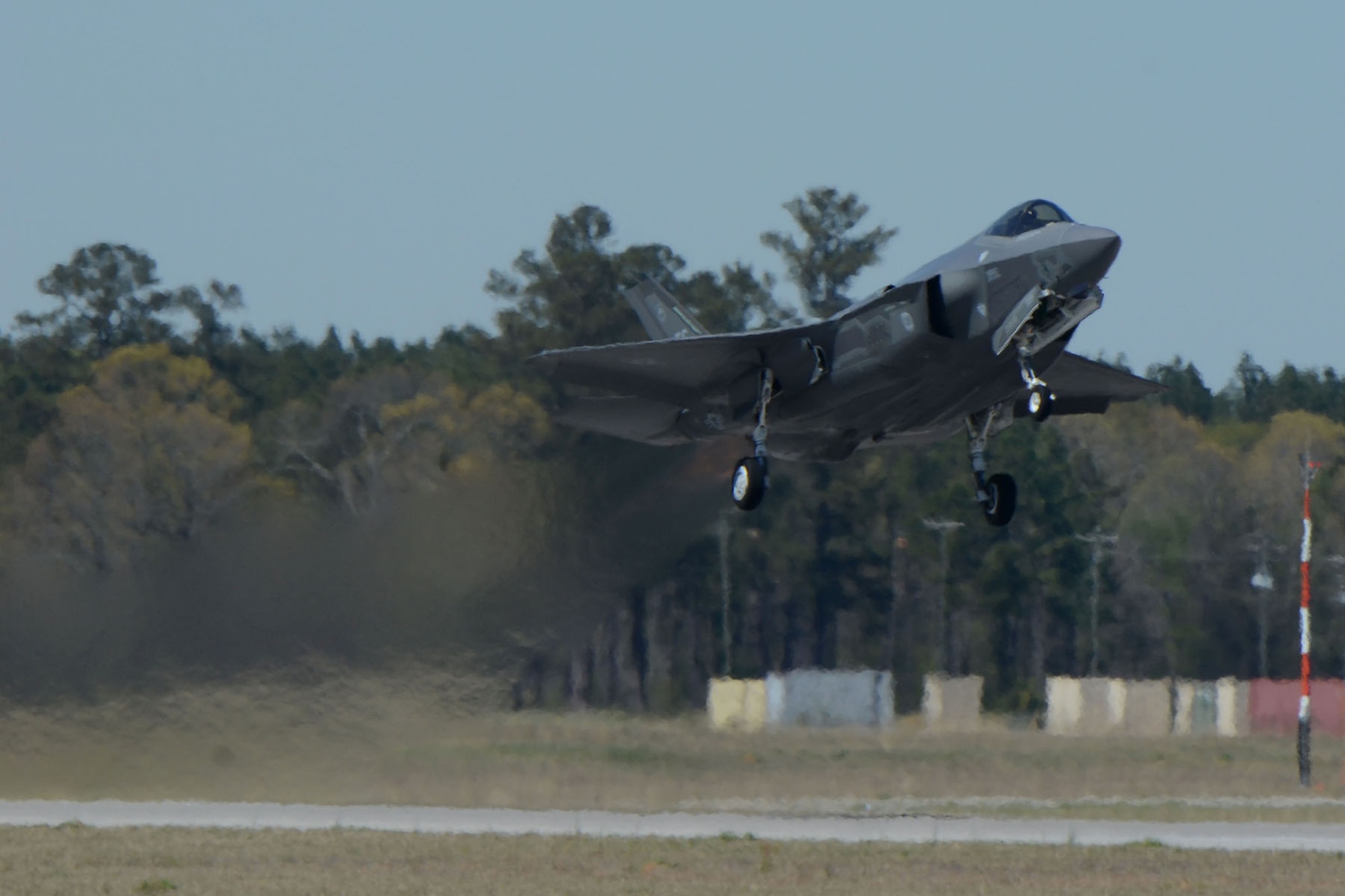 Two U.S. Air Force F-35A Lightning II fighter jets, assigned to the 33rd Fighter Wing from Eglin Air Force Base, Fla., visit McEntire Joint National Guard Base, S.C., for the first time to train with F-16 Fighting Falcon fighter pilots from the South Carolina Air National Guard's 169th Fighter Wing, March 22, 2016.  The aircraft conducted 4th and 5th generation integration fighter training, during local training missions, Mar. 21st and 22nd. (U.S. Air National Guard photo by Senior Airman Ashleigh Pavelek)