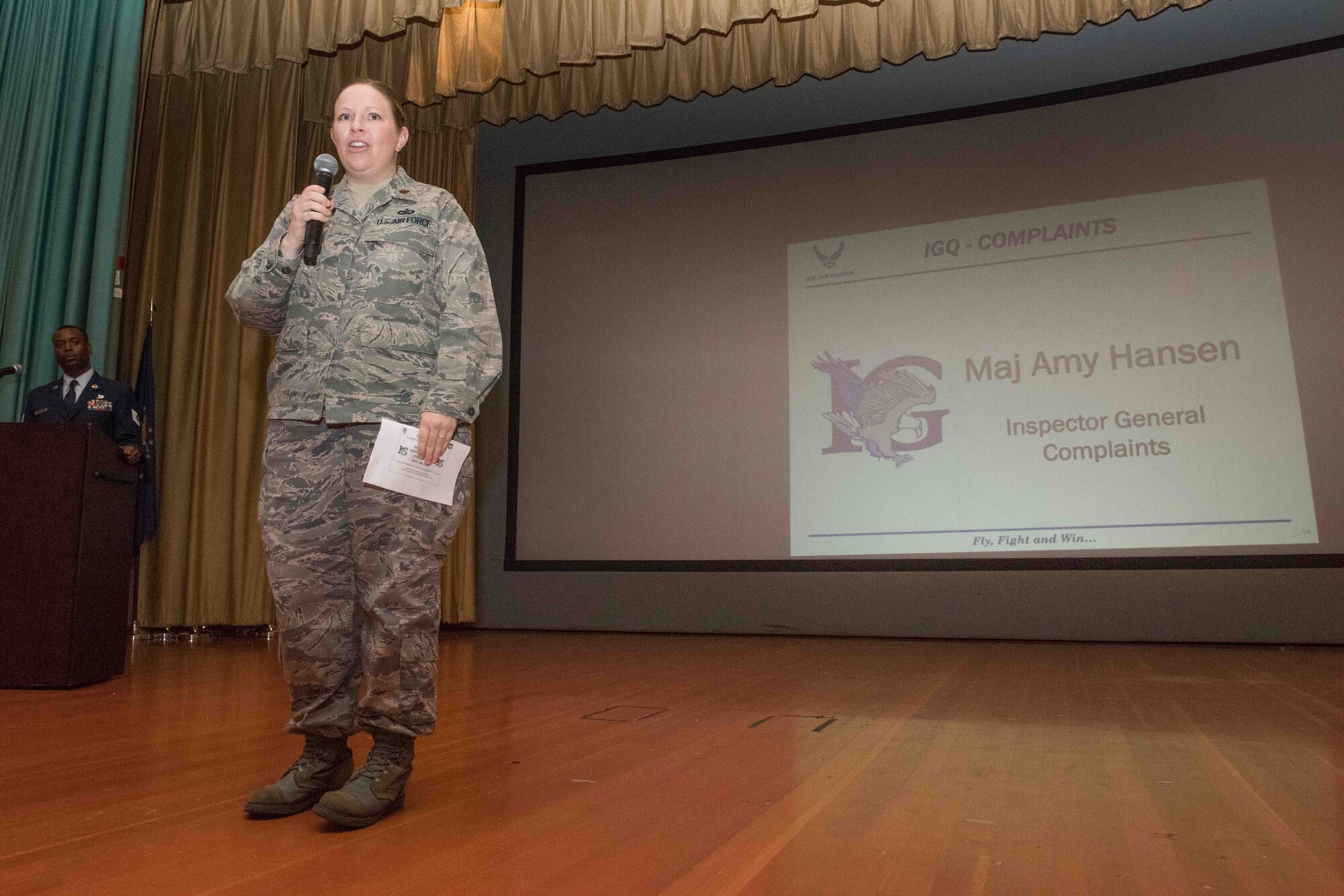 Maj. Amy Hansen, 940th Wing Inspector General, gave an overview of her services at the 940th Wing commander’s all call March 5, 2016 at Beale Air Force Base, California. As inspector general she oversees the prevention of government fraud, waste and abuse, serves as the eyes and ears for the wing commander, and acts as a resource for those unable to resolve concerns through their chain of command. (U.S. Air Force Photo/ Tech. Sgt. Kenneth McCann)