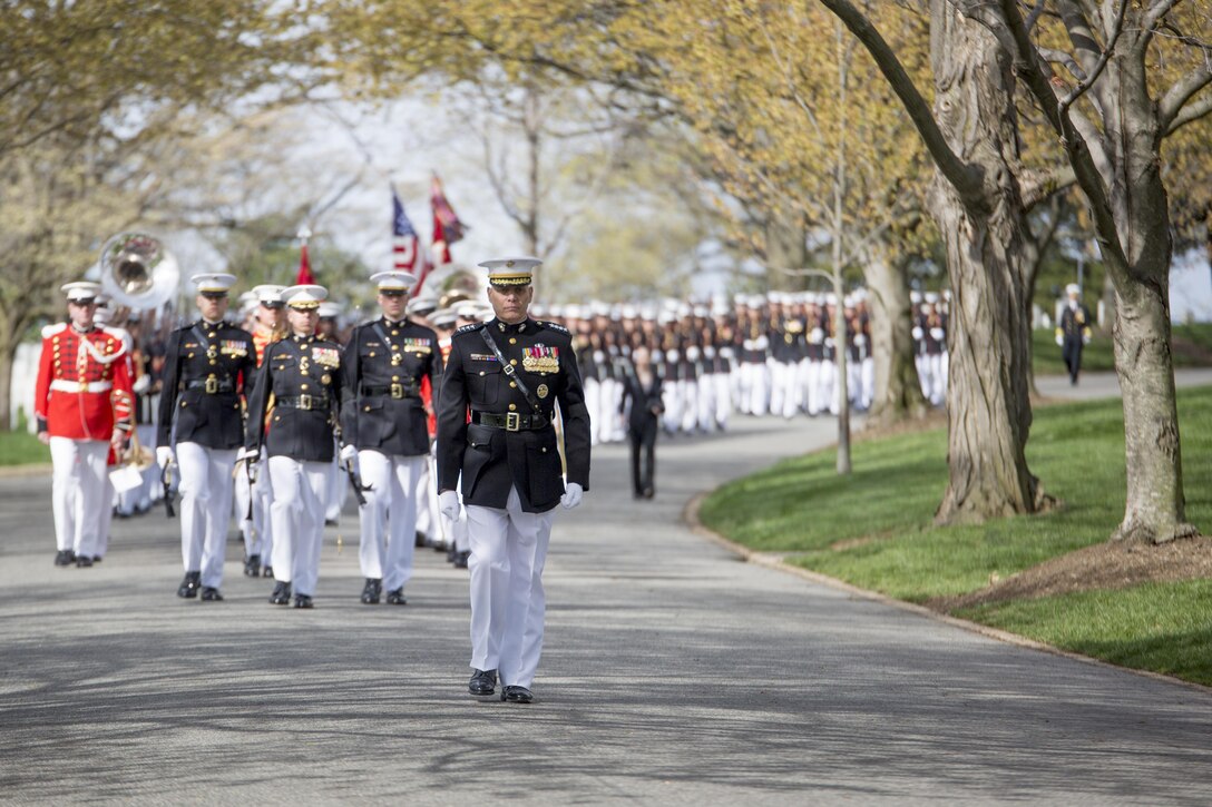 Gen. John M. Paxton Jr., assistant commandant of the Marine Corps, and a procession of Marines from Marine Barracks, Washington, D.C., march through Arlington National Cemetery, Virginia during a full honors funeral for Gen. Earl Edward Anderson, March 31, 2016. Anderson was the first active duty Marine Naval Aviator to be promoted to a four-star rank, and he became the assistant commandant of the Marine Corps on April 1, 1972.