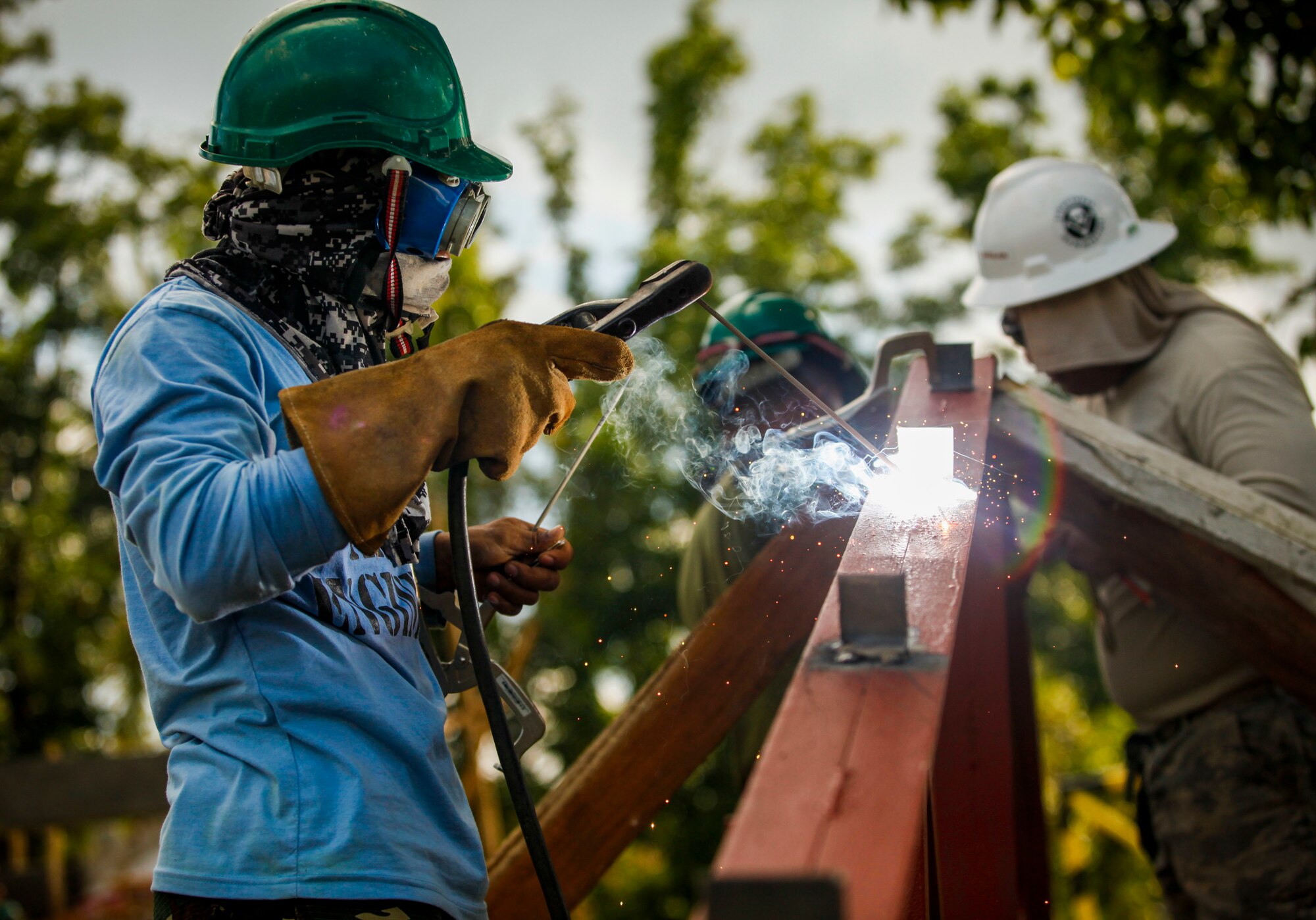 Philippine army soldier Pfc. Randy Quidores, engineer, assigned to the 552nd Engineer Construction Battalion, welds a roof frame for a new classroom being built at the Jaena Norte Elementary School, in Capiz, Philippines, during Exercise Balikatan, March 29, 2016. The construction project is one of multiple HCAs taking place during this year's exercise, designed to improve the quality of life for the local populace and strengthen the bond between our two nations. Balikatan, which means "shoulder to shoulder" in Filipino, is an annual bilateral training exercise aimed at improving the ability of Philippine and U.S. military forces to work together during planning, contingency and humanitarian assistance and disaster relief operations.  (U.S. Marine Corps Combat Camera photo by Cpl. Hilda M. Becerra / Released)
