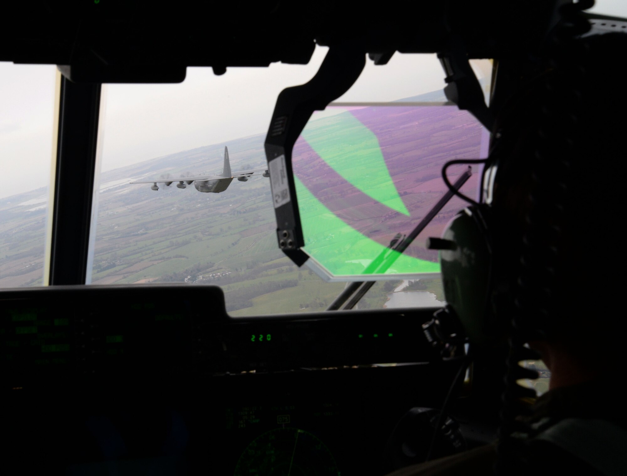 Two MC-130J Commando II aircraft assigned to RAF Mildenhall, England, fly to the coast of the Norfolk Sea to perform an over water combat mission profile March 24, 2016. Following the over water mission, the crew performed a cargo airdrop and then transitioned into receiving and performing aerial refueling. The day’s events illustrated the proficiency of the aircrew and the versatility of the aircraft. (U.S. Air Force photo by Senior Airman Justine Rho/Released)