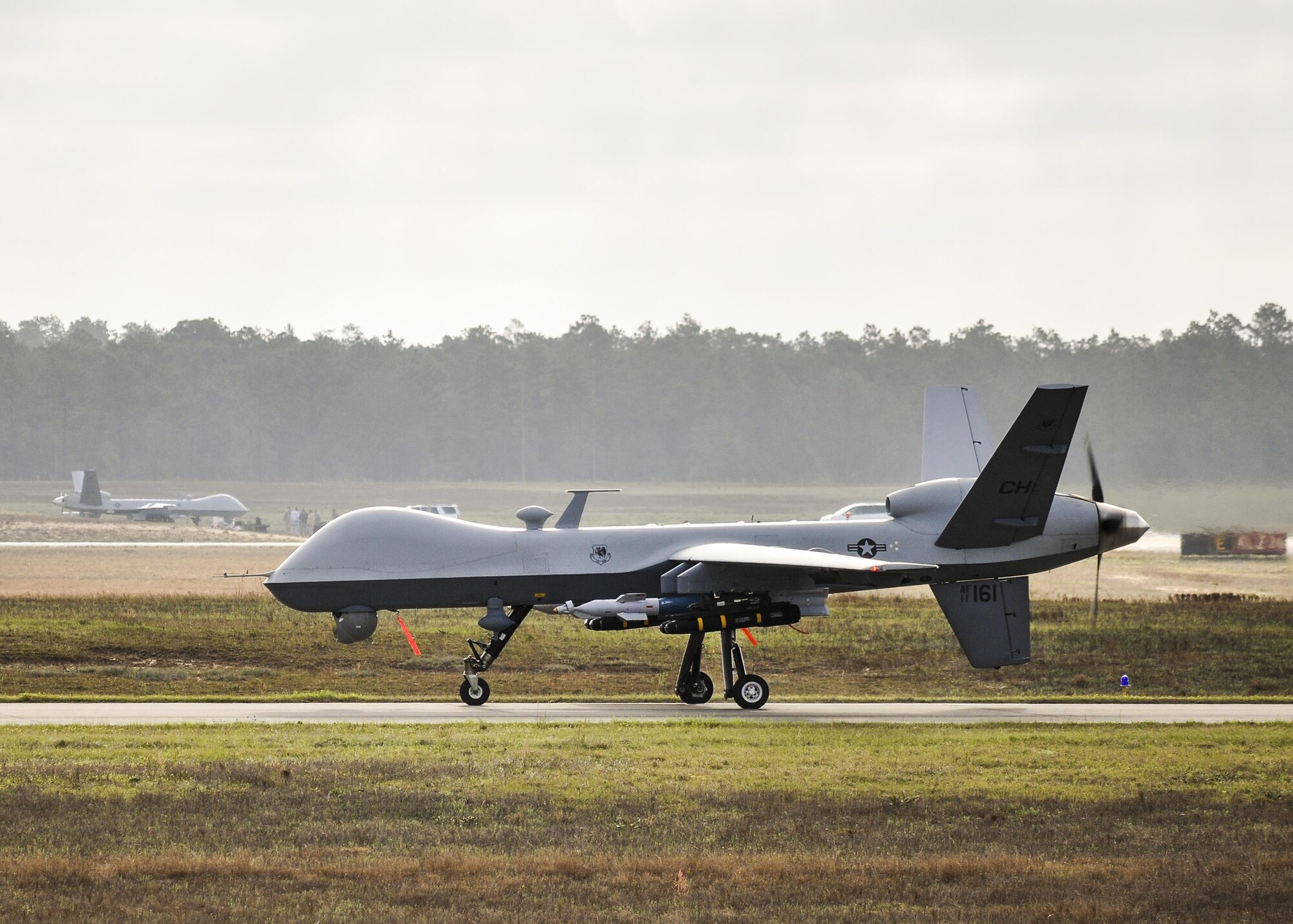 An MQ-9 Reaper prepares to take off from Duke Field, Fla., March 15. The Reapers operated at both Duke Field and Eglin Air Force Base, Fla., during the air-to-ground Weapon System Evaluation Program, Combat Hammer, from March 14-17. (U.S. Air Force photo by Susan Garcia)