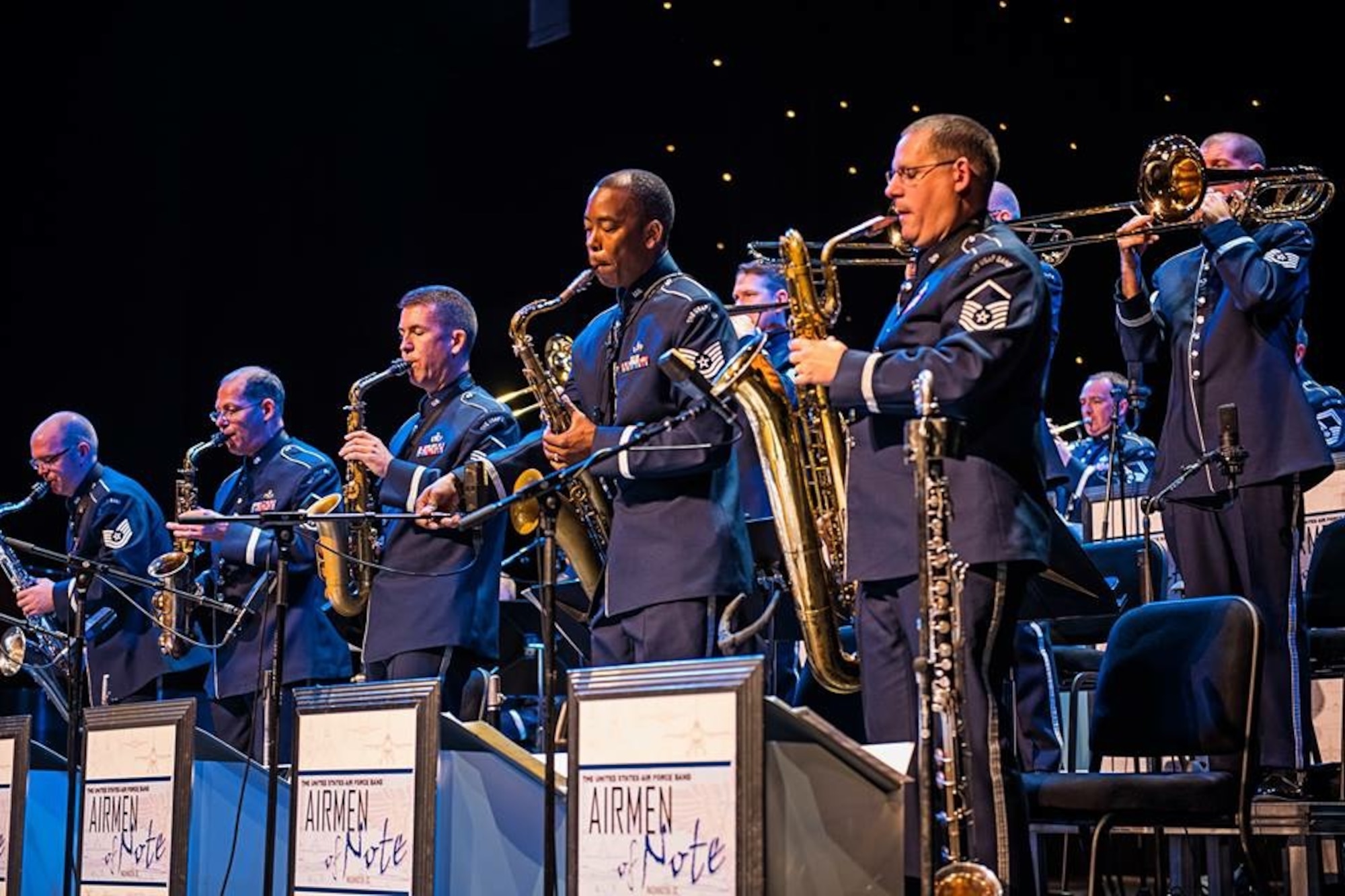 The Airmen of Note saxophone and trombone sections stand for a
solo section during a tour performance at Pasquerilla Performing Arts Center
in Johnstown, Pennsylvania. The group will perform at various venues
throughout La., and Texas on their upcoming spring tour.  (U.S. Air Force
photo by Staff Sgt. Mike Fariss/released)