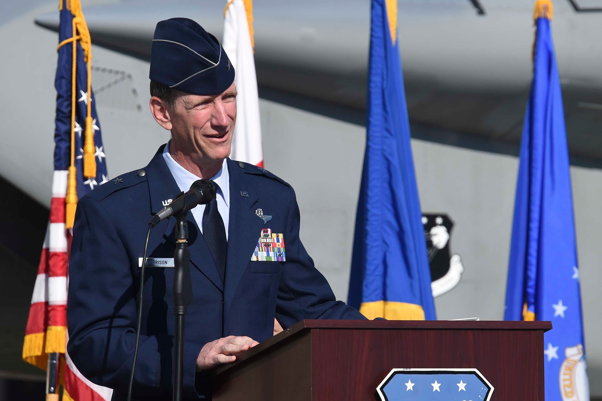 U.S. Air Force Brig. Gen. Clay Garrison, 144th Fighter Wing outgoing commander, speaks at the 144th FW change of command ceremony at the Fresno Air National Guard Base April 2, 2016. Garrison relinquished command to U.S. Air Force Col. Reed Drake. (U.S. Air National Guard photo by Senior Airman Klynne Pearl Serrano)