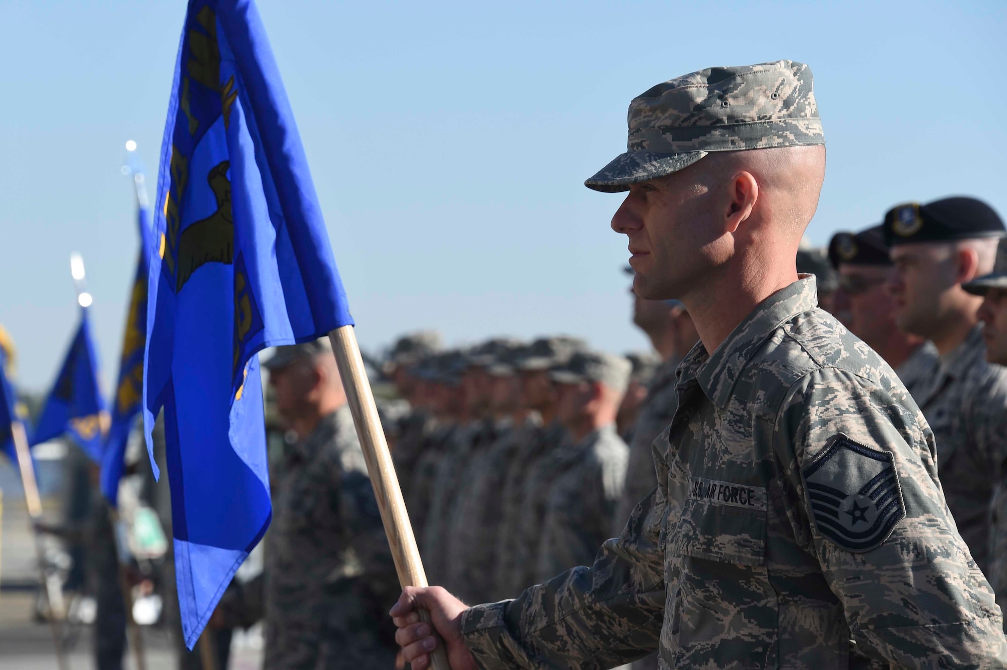 Airmen assigned to the 144th Fighter Wing stand in formation during a change of command ceremony at the Fresno Air National Guard Base April 2, 2016. U.S. Air Force Col. Reed Drake assumed command of the 144th FW from U.S. Air Force Brig. Gen. Clay Garrison, who will continue his service as the Assistant Adjutant General-Air California National Guard. (U.S. Air National Guard photo by Senior Airman Klynne Pearl Serrano)