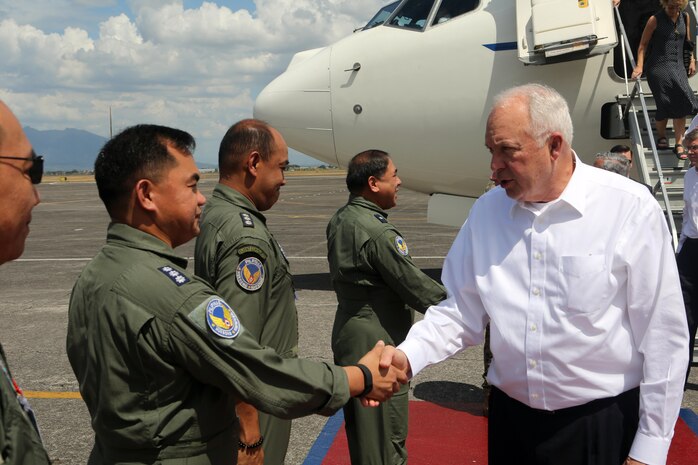 U.S. Sen. John Kline, Chairman of Education and the Workforce Committee, is greeted by U.S and Philippine military service members after landing at Clark Airbase, Philippines, on April 1, 2016.  While at Clark Airbase the senators attended a Balikatan 16 brief and toured several military aircraft.  This year marks the 32nd iteration of Balikatan where U.S. service members work “shoulder-to-shoulder” with members of the Armed Forces of the Philippines to increase combined readiness to crises and conflict across the Indo-Asia-Pacific region. 