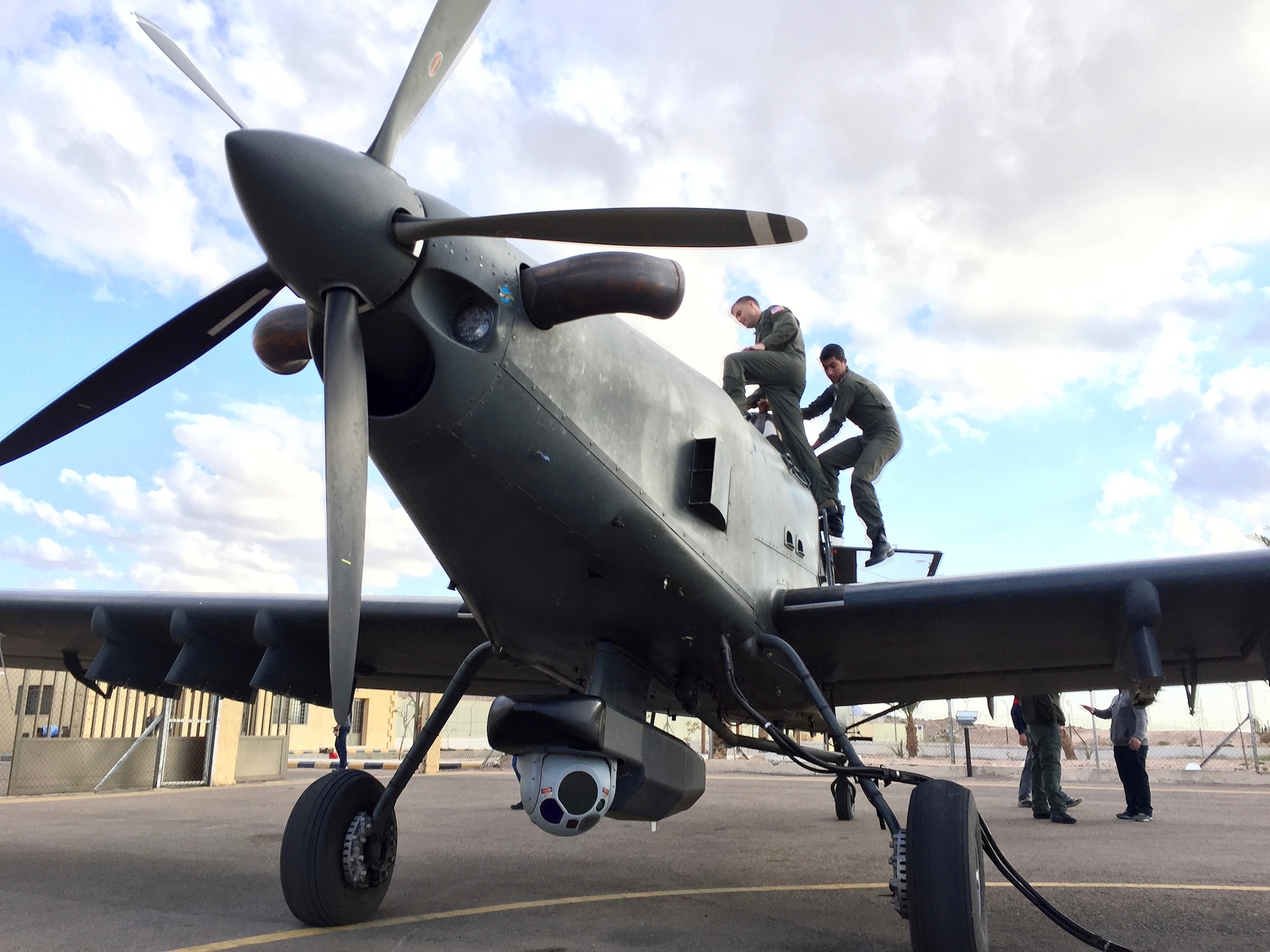 Combat Aviation Advisors help partner nation mechanics with aircraft maintenance during a deployed mission in March.  A CAA deployment sends a small team of Airmen to assess, advise, train, and assist friendly and allied forces with their own airpower resources.  Duke Field is the home of the only two CAA squadrons in the Air Force, the active-duty 6th Special Operations Squadron and the Reserve 711th SOS.  (Courtesy photo)