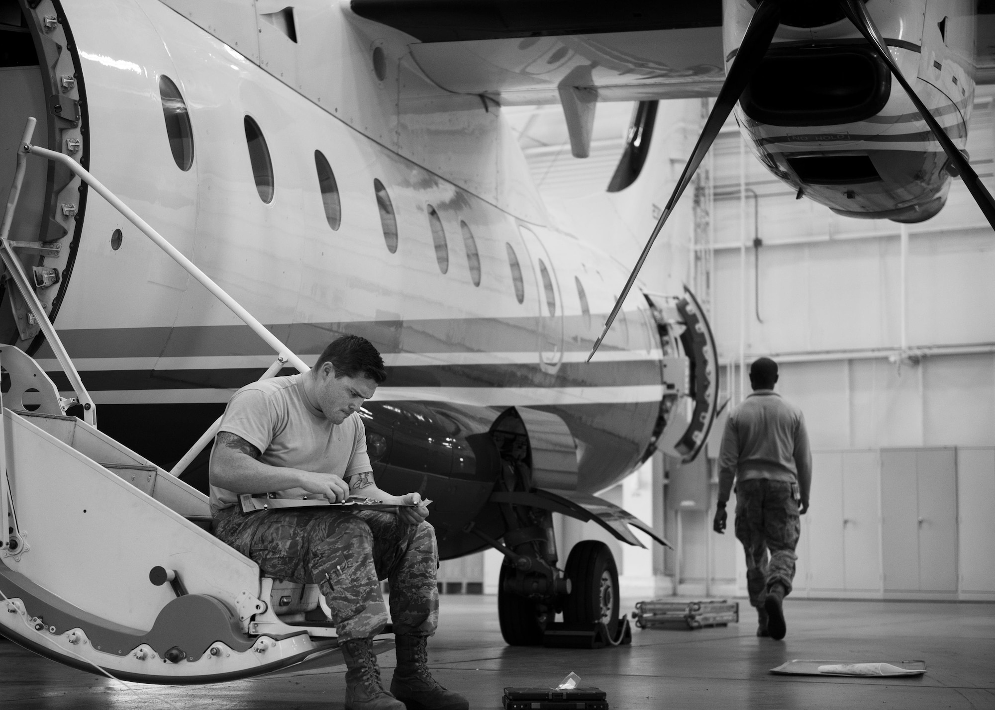 Staff Sgt. Jesse Brazell, 592nd Special Operations Maintenance Group, works on a panel from the C-146 Wolfhound March 31 at Duke Field, Fla.  The 592nd SOMXS and the 919th Special Operations Aircraft Maintenance Squadron assigned a dedicated crew chief and assistant crew chief to each of the aircraft at Duke Field. Each aircraft has an active-duty and reserve crew chief assigned to it.  (U.S. Air Force photo/Tech. Sgt. Jasmin Taylor)