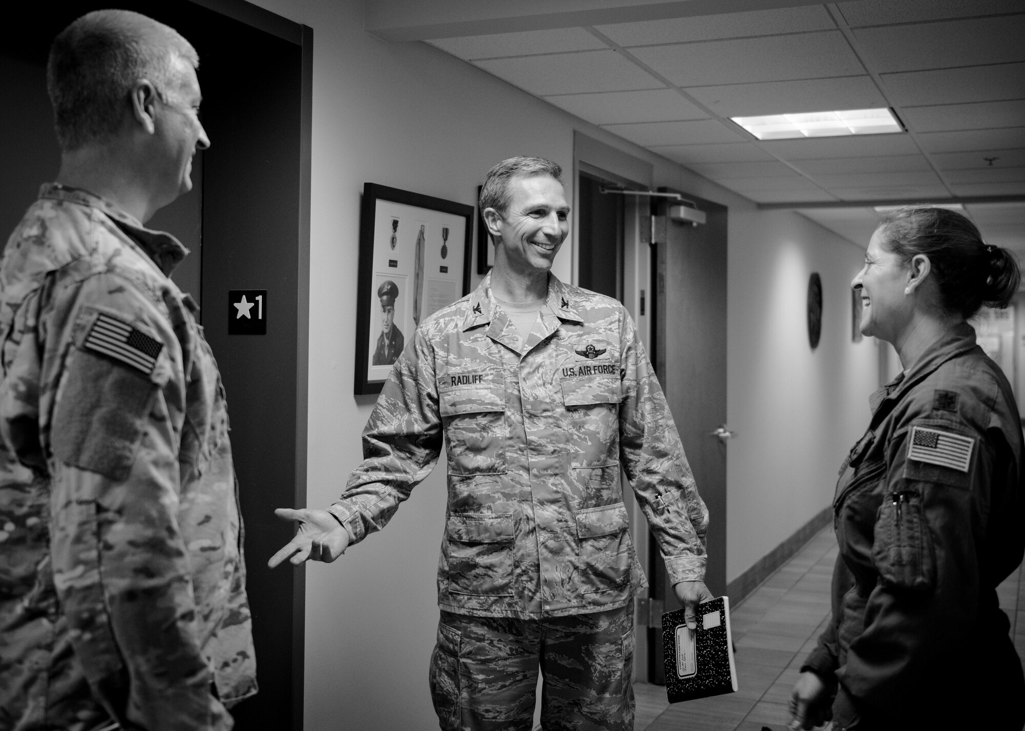 Col. Bryan Ratliff, 10th Air Force vice commander, chats with 919th Special Operations Wing leadership, during an immersion tour of Duke Field March 31.  The purpose of the tour was to learn the integration of the wing's mission, operations and personnel. (U.S. Air Force photo/Tech. Sgt. Jasmin Taylor)