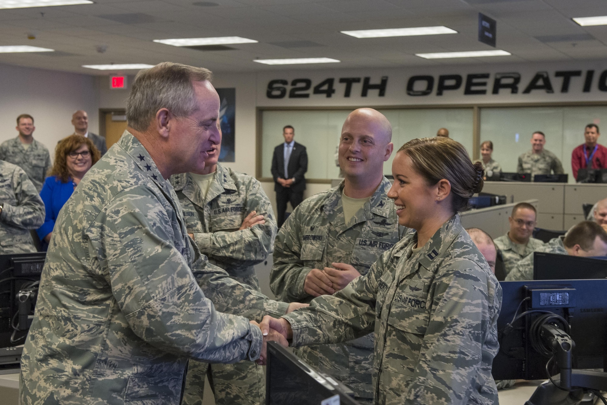 Maj. Amber Daugherty, 854th Combat Operations Squadron Deputy, greets the U.S. Air Force Chief of Staff, Gen. Mark Welsh III, before briefing him on the current state of Air Force cyber command and control in August 2015. The 854th COS is the Reserve Associate Unit to the 624th Operations Center, and operates the Cyberspace Command and Control Mission System, which commands and controls full spectrum cyber operations and capabilities in support of Air Force and Joint requirements. (U.S. Air Force courtesy photo)
