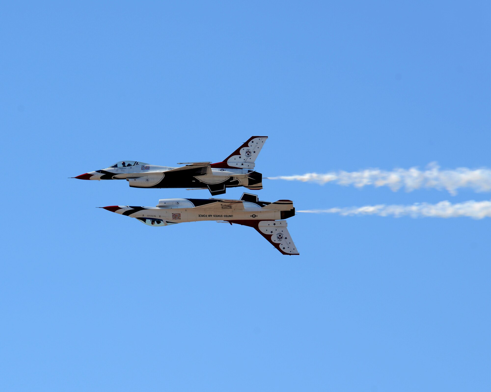 The U.S. Air Force Thunderbirds fly overhead at the Luke Air Force Base air show, 75 Years of Airpower Apr. 2, 2016.  The team performs precision aerial maneuvers to exhibit the capabilities of the modern high-performance aircraft to audiences worldwide.  (U.S. Air Force photo by Senior Airman Devante Williams)