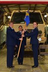 (Left) Col. Lisa M. Craig, 433rd Mission Support Group commander, passes the 433rd Logistics Readiness Squadron guidon to new squadron commander, Maj. Coleen A. Barnett, during a change of command ceremony April 2, 2016 at the Cargo Load Facility on Joint Base San Antonio-Lackland. Prior to taking command of the 433rd LRS, Barnett was an operations officer within the unit. (U.S. Air Force photo by Tech. Sgt. Lindsey Maurice)