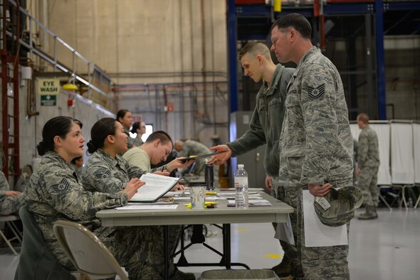 Airmen from the 934th Airlift Wing proceeded through a mass processing line at the Minneapolis-St. Paul Air Reserve Station in order to complete their annual medical requirements. (U.S. Air Force photo by Staff Sgt. Corban D. Lundborg/Released)