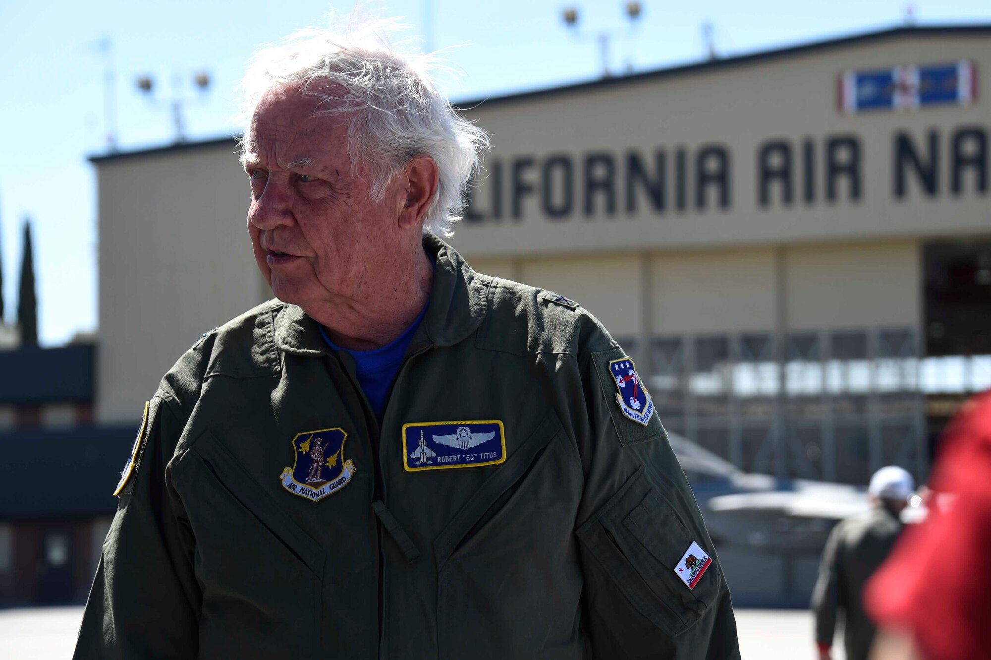 U.S. Air Force Brig. Gen. (ret.) Robert Earthquake Titus visits the 144th Fighter Wing flight line at the Fresno Air National Guard Base, April 1, 2016. Titus is the 144th Fighter Wing's 3rd Annual Heritage Week honored guest, who shared his personal experiences as a fighter pilot with the 144th FW Airmen. (U.S. Air National Guard photo by Senior Airman Klynne Pearl Serrano)