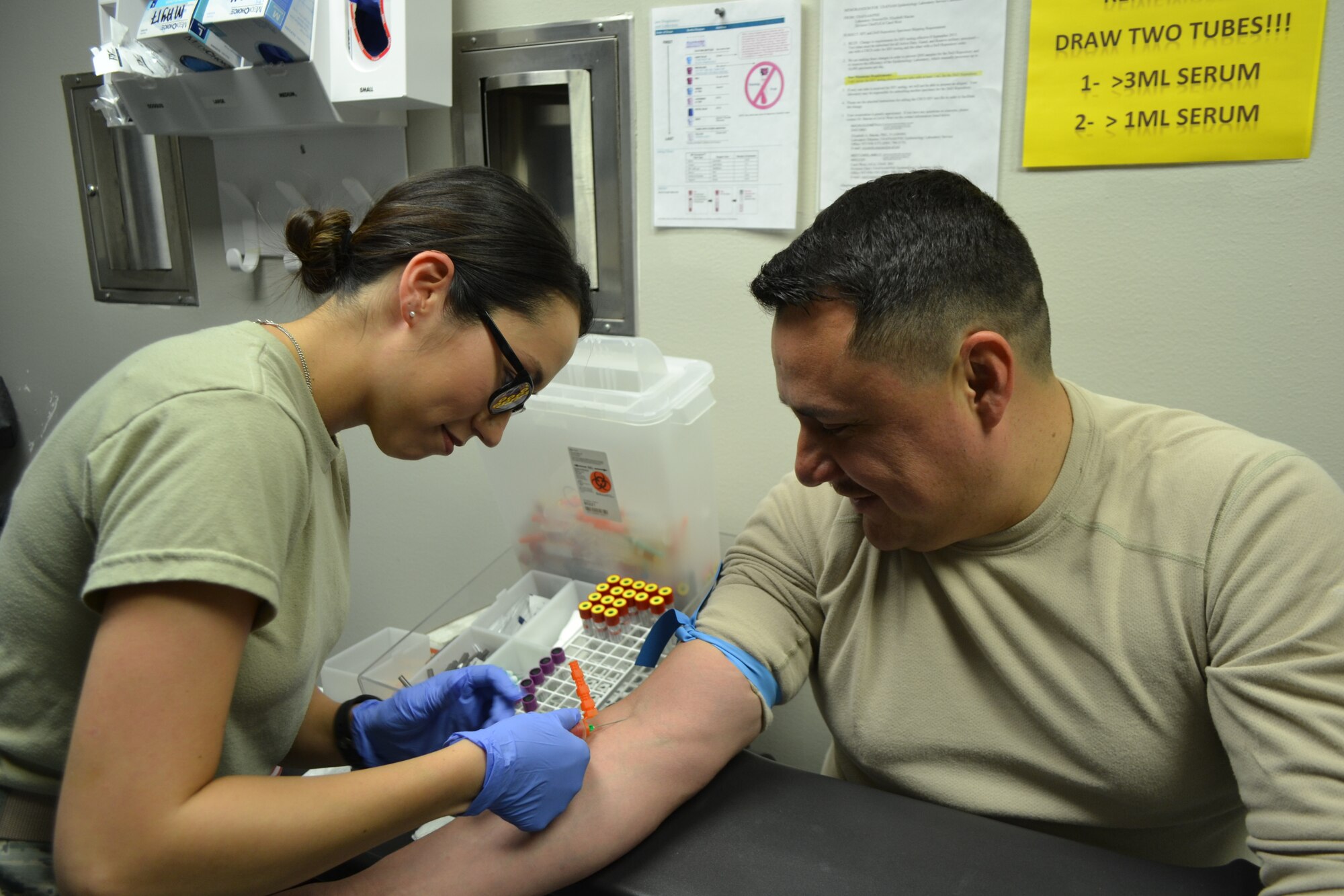 Senior Airman Anissa Testaverde, a 147th Medical Group, medical technician, accomplishes a blood draw for Senior Airman Felipe Sanchez, a Response Force Leader with the 147th Security Forces Squadron on April 2, 2016 at Ellington Field Joint Reserve Base. Sanchez is getting his blood drawn at the medical group as part of individual readiness requirements.
