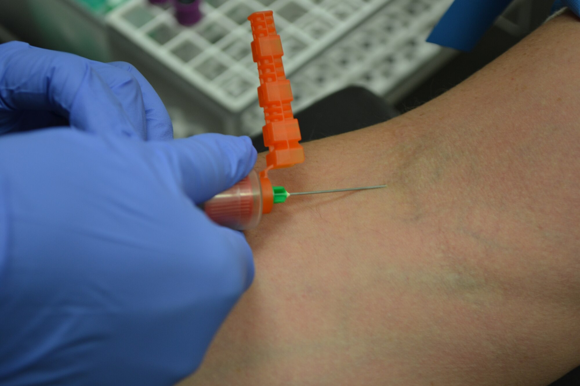 Senior Airman Anissa Testaverde, a 147th Medical Group, medical technician, accomplishes a blood draw for Senior Airman Felipe Sanchez, a Response Force Leader with the 147th Security Forces Squadron on April 2, 2016 at Ellington Field Joint Reserve Base. Sanchez is getting his blood drawn at the medical group as part of individual readiness requirements.