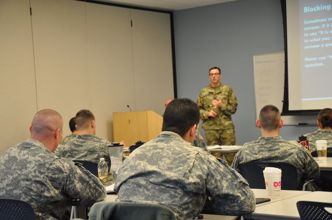 Capt. Mike Petersen, Connecticut National Guard State Public Affairs Officer, teaches unit public affairs representative trainees how to interact with the civilian media during the 2016 UPAR training course at the Regional Training Institute, Camp Niantic, Jan 30-31. UPARs were also instructed on basic writing skills, unit social media conduct, developing  story ideas and taking photos. (Photo by Allison L. Joanis, State Public Affairs Office)