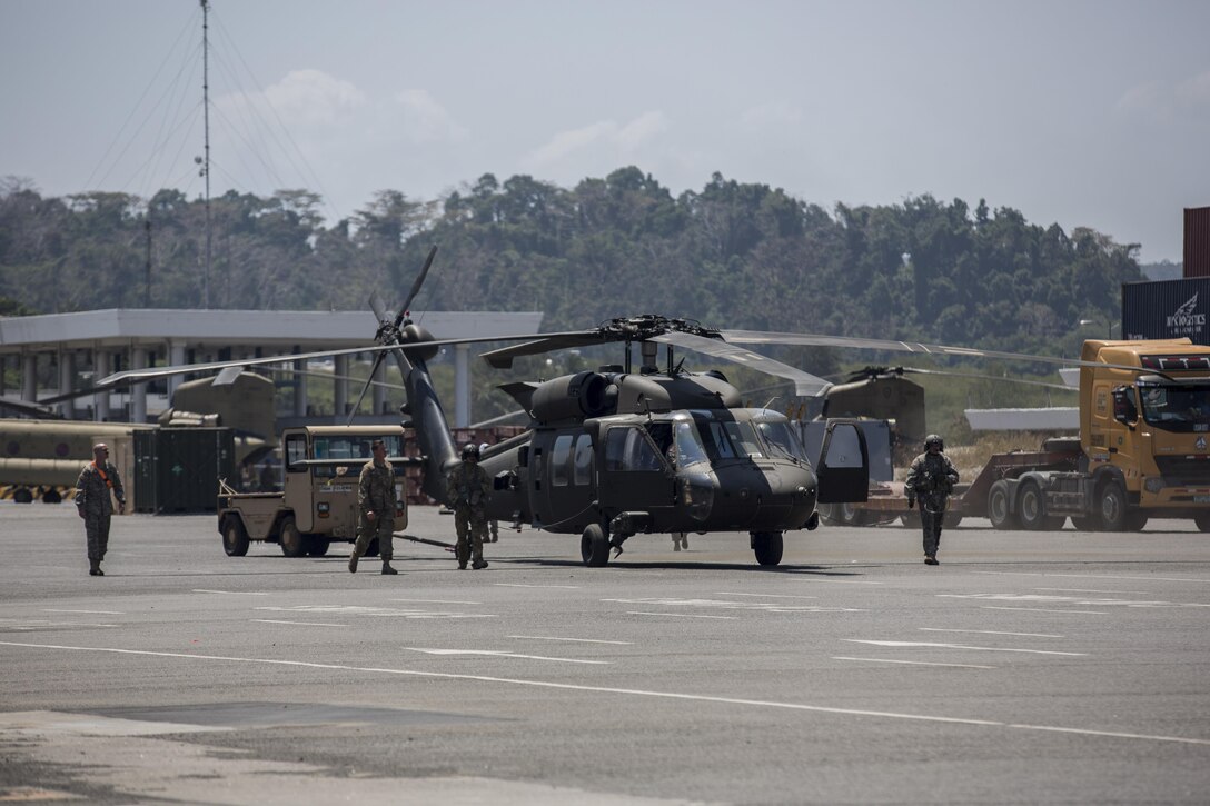 U.S. Soldiers with Bravo Co., 2-25 Aviation Regiment prepare the U.S. Army UH-60M Black Hawk Helicopter for flight in Subic Bay, Philippines during Balikatan 2016 (BK 16) on April 3, 2016.  The purpose of BK 16 is to strengthen interoperability and partner-nation capabilities for the planning and execution of military operations, and advance regional security operations. 