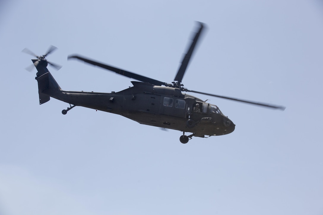 A U.S. Army UH-60M Black Hawk Helicopter takes off for flight in Subic Bay, Philippines during Balikatan 2016 (BK 16) on April 3, 2016.  The purpose of BK 16 is to strengthen interoperability and partner-nation capabilities for the planning and execution of military operations, and advance regional security operations.