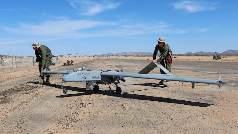 Marines with Marine Unmanned Aerial Vehicle Squadron 1 rolls the RQ-7Bv2 Shadow, an unmanned aerial system, unto the runway at Cannon Air Defense Complex in Yuma, Arizona, March 25, 2016. Marine Wing Support Squadron 371 and MWSS-274 supported VMU-1 by building a runway in preparation for the Shadow’s first flight at the site. 
