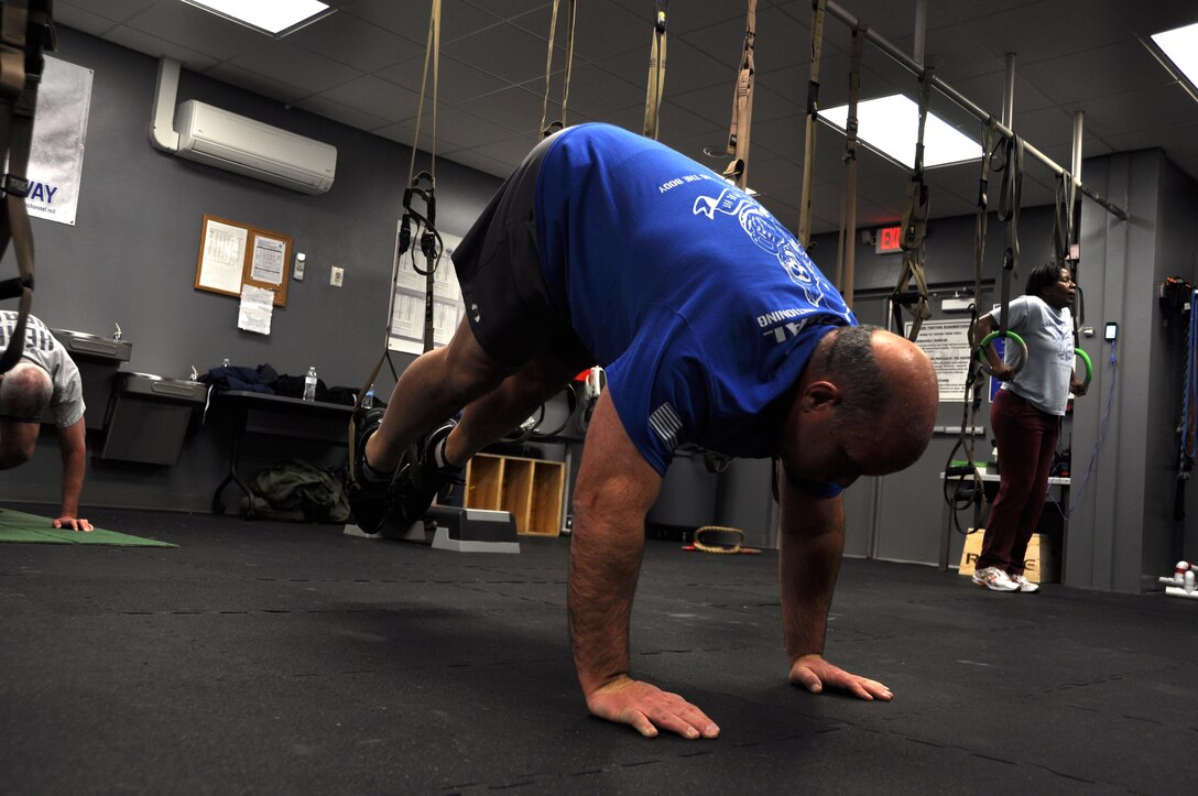 Student of Mikula’s weekly fit camp, participate in circuit training February 25, 2016 at the Human Performance Center of Dobbins Air Reserve Base, Ga. Instructor John Mikula creates various level workouts for all participants. (U.S. Air Force photo by Senior Airman Lauren Douglas) 