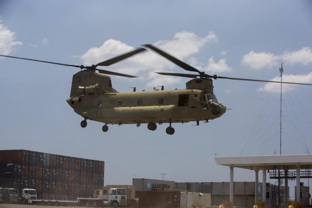 An Army Boeing CH-47 Chinook takes off during Balikatan 2016 in Subic Bay, Philippines, April 3, 2016. The exercise seeks to strengthen interoperability and partner-nation capabilities for planning and executing of military operations. Marine Corps photo by Lance Cpl. Damon A. Mclean