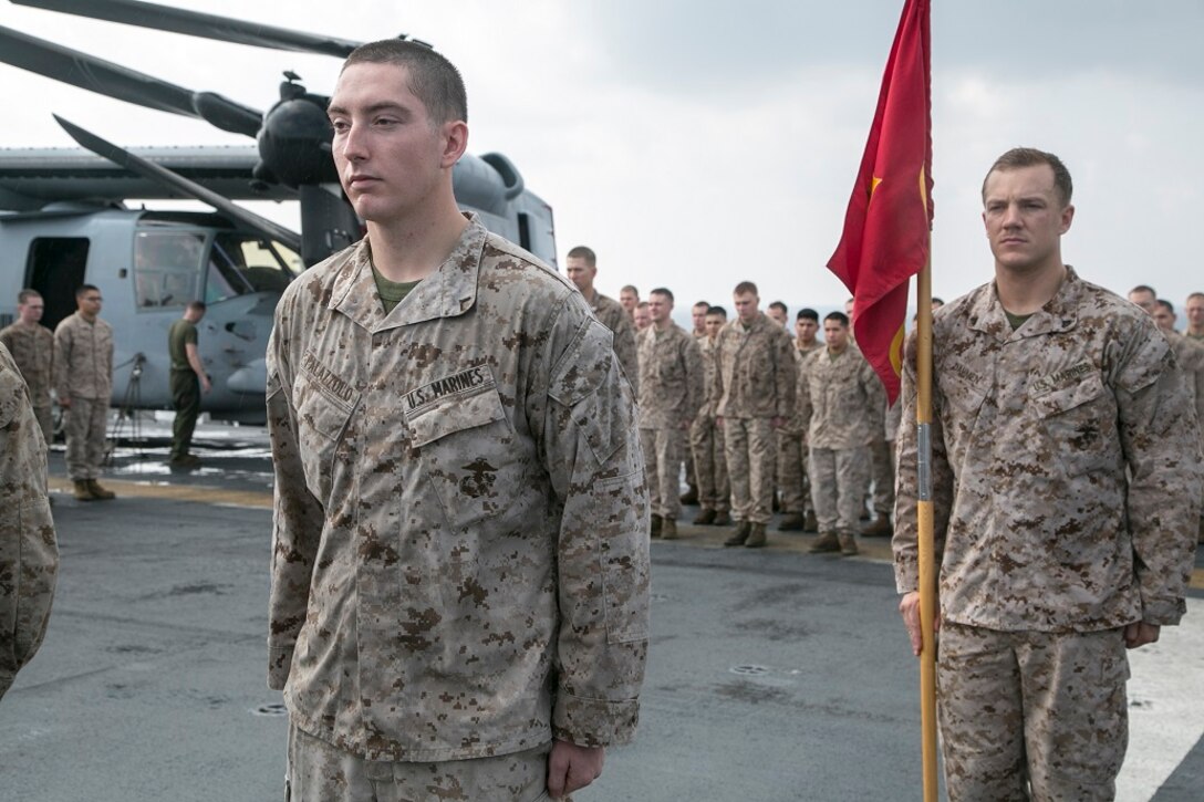 AT SEA (April 1, 2016)-U.S. Marines with the 13th Marine Expeditionary Unit, hold a promotion ceremony, April 1, 2016, during the MEU's western pacific deployment aboard the USS Boxer. More then 4,500 Marines and Sailors from the Boxer ARG, 13th MEU team are currently transiting the Pacific Ocean toward the U.S. 5th fleet area of operations during a scheduled deployment. (U.S. Marine Corps photo by Sgt. Briauna Birl/RELEASED)