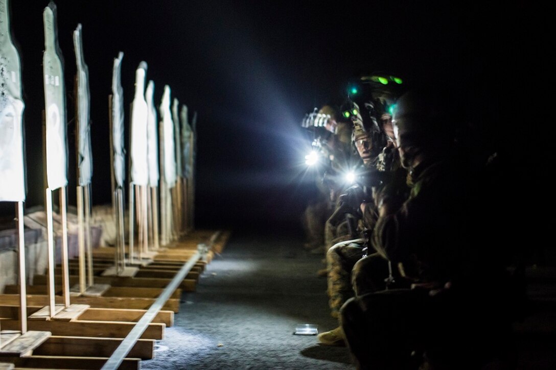 U.S. Marines with Maritime Raid Force, 13th Marine Expeditionary Unit, conduct a deck shoot at night during their Western Pacific Deployment 16 aboard the USS New Orleans, April 1, 2016. More then 4,500 Marines and Sailors from the Boxer ARG, 13th MEU team are currently transiting the Pacific Ocean toward the U.S. 5th fleet area of operations during a scheduled deployment. (U.S. Marine Corps photo by Sgt. Hector de Jesus/RELEASED)