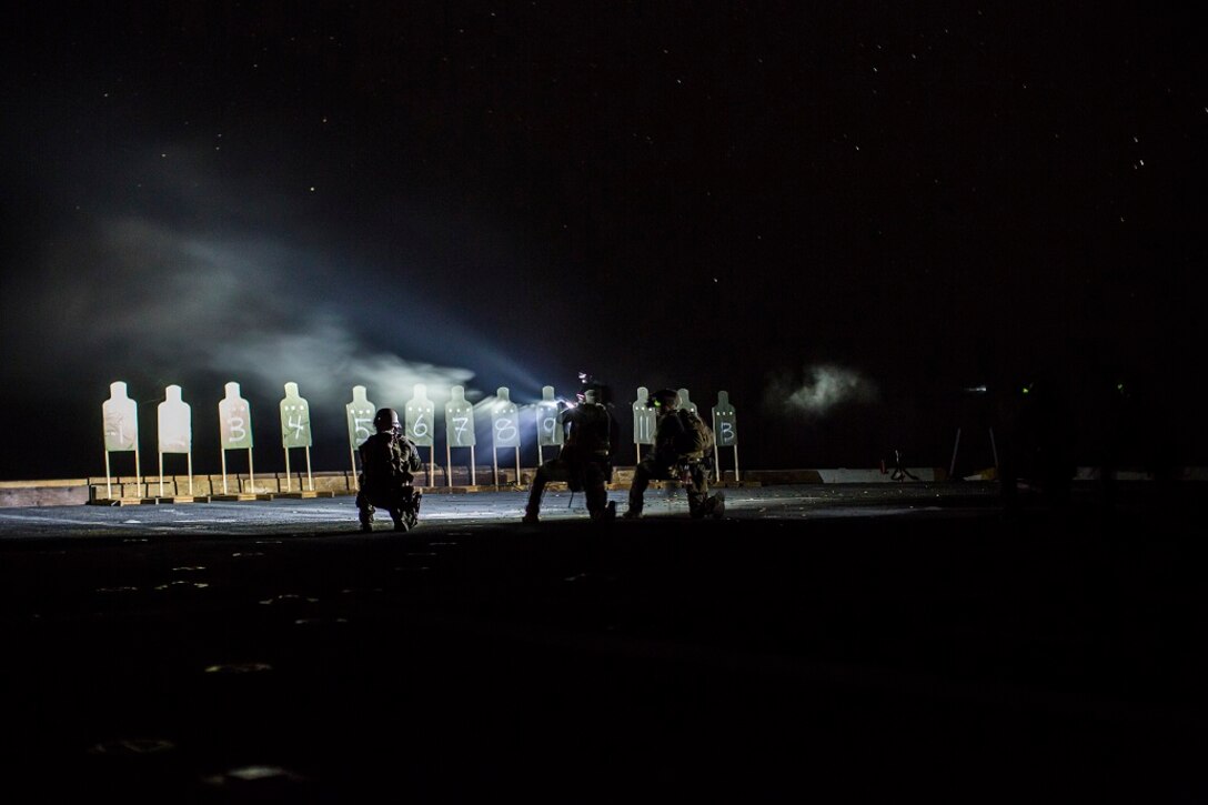 U.S. Marines with Maritime Raid Force, 13th Marine Expeditionary Unit, conduct a deck shoot at night during their Western Pacific Deployment 16 aboard the USS New Orleans, April 1, 2016. More then 4,500 Marines and Sailors from the Boxer ARG, 13th MEU team are currently transiting the Pacific Ocean toward the U.S. 5th fleet area of operations during a scheduled deployment. (U.S. Marine Corps photo by Sgt. Hector de Jesus/RELEASED)