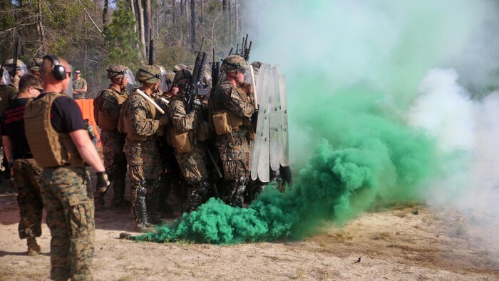 Marines with Combat Logistics Battalion 2 walk down a non-lethal weapons training range during the unit’s non-lethal weapons training final exercise at Marine Corps Base Camp Lejeune, North Carolina, March 25, 2016. The battalion had to qualify through the Expeditionary Operations Training Group in preparation for their upcoming deployment with Special Purpose Marine Air-Ground Task Force-Crisis Response-Africa.