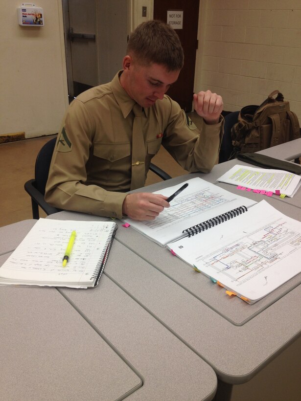 LCpl Sanders is studying schematics to understand the theory of operation of the AN/TRC-170. Students in the Digital Wideband Repair Course study this radio system down to the component level in order to more effectively troubleshoot similar complex systems in the Fleet Marine Forces. LCpl Sanders holds the billet of class NCO and has a GPA of 83.61.