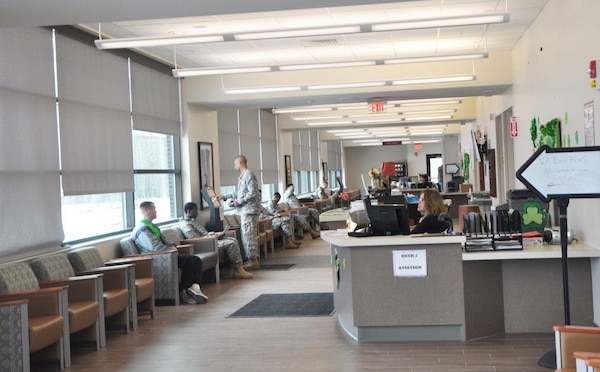 Soldiers sitting in the Waiting Room of The Bowe Troop Medical Clinic. This clinic provides primary care and medical readiness for soldiers of the 10th Mountain Division and Air force on Fort Drum. The clinic will provide better and faster service for our soldiers. 