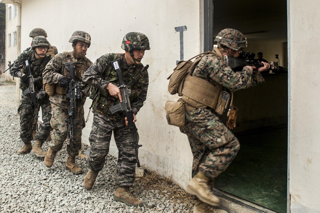 U.S. and South Korean Marines conduct military operations on urban terrain training as a part of the Korean Marine Exchange Program in South Korea, April 2, 2016. The program aims to increase interoperability and camaraderie between Marines from the two nations. The U.S. Marines are assigned to 1st Battalion, 3rd Marine Regiment. Marine Corps photo by Cpl. Erick Loarca
