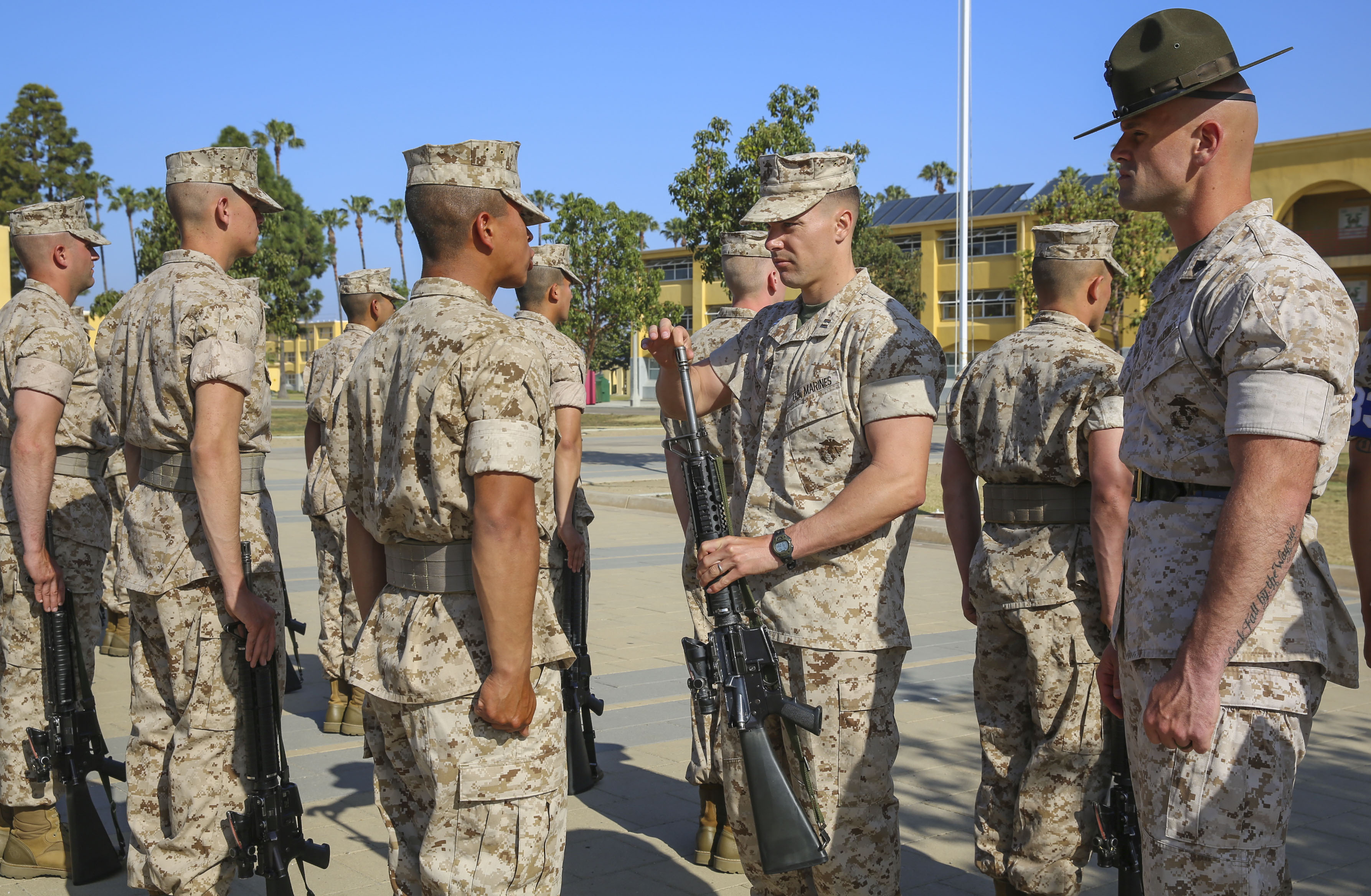 A recruit from Mike Company, 3rd Recruit Training Battalion, applies a choke  hold during a Marine Corps Martial Arts Program test at Marine Corps  Recruit Depot San Diego, July 20. The recruits