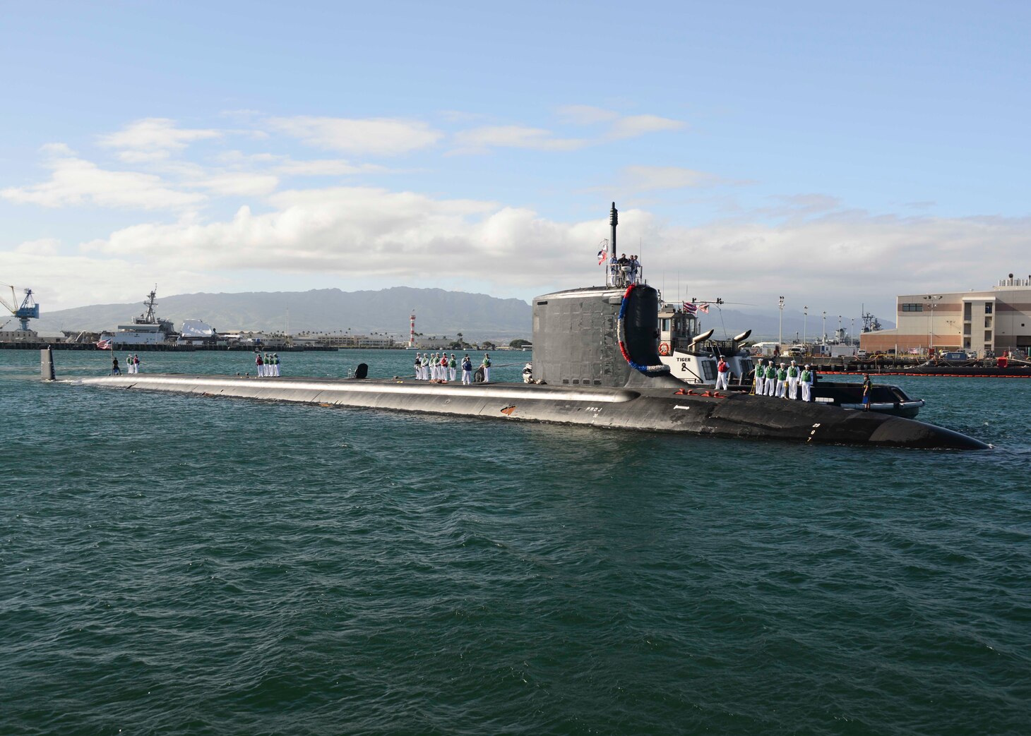 PEARL HARBOR (Nov. 25, 2014) The Virginia-class attack submarine USS Mississippi (SSN 782) arrives at Joint Base Pearl Harbor-Hickam for a change of homeport from Commander, Submarine Squadron (SUBRON) 4 in Groton, Conn., to SUBRON-1. Mississippi is the 4th Virginia-class submarine to be home ported in Pearl Harbor, and one of 18 attack submarines permanently homeported at the historic base. (U.S. Navy photo by Mass Communication Specialist 1st Class Steven Khor/Released)