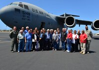 Members of the 15th Wing and Friends of Hickam stand in front of a C-17 Globemaster III during a base tour on Joint Base Pearl Harbor-Hickam, March 31, 2016. The tour highlighted some of the 15th Wings agencies including Security Forces, Explosive Ordines Disposal, Maintenances and the 15th Medical Group. The Friends of Hickam serve as facilitators between the 15th Wing command and the Hawaii community. The purpose of the Friends of Hickam is to provide public support for the U.S. Air Force in Hawaii and its missions. They also help to improve the quality of life for Air Force personnel and their families. (U.S. Air Force photo by Tech. Sgt. Aaron Oelrich/released) 